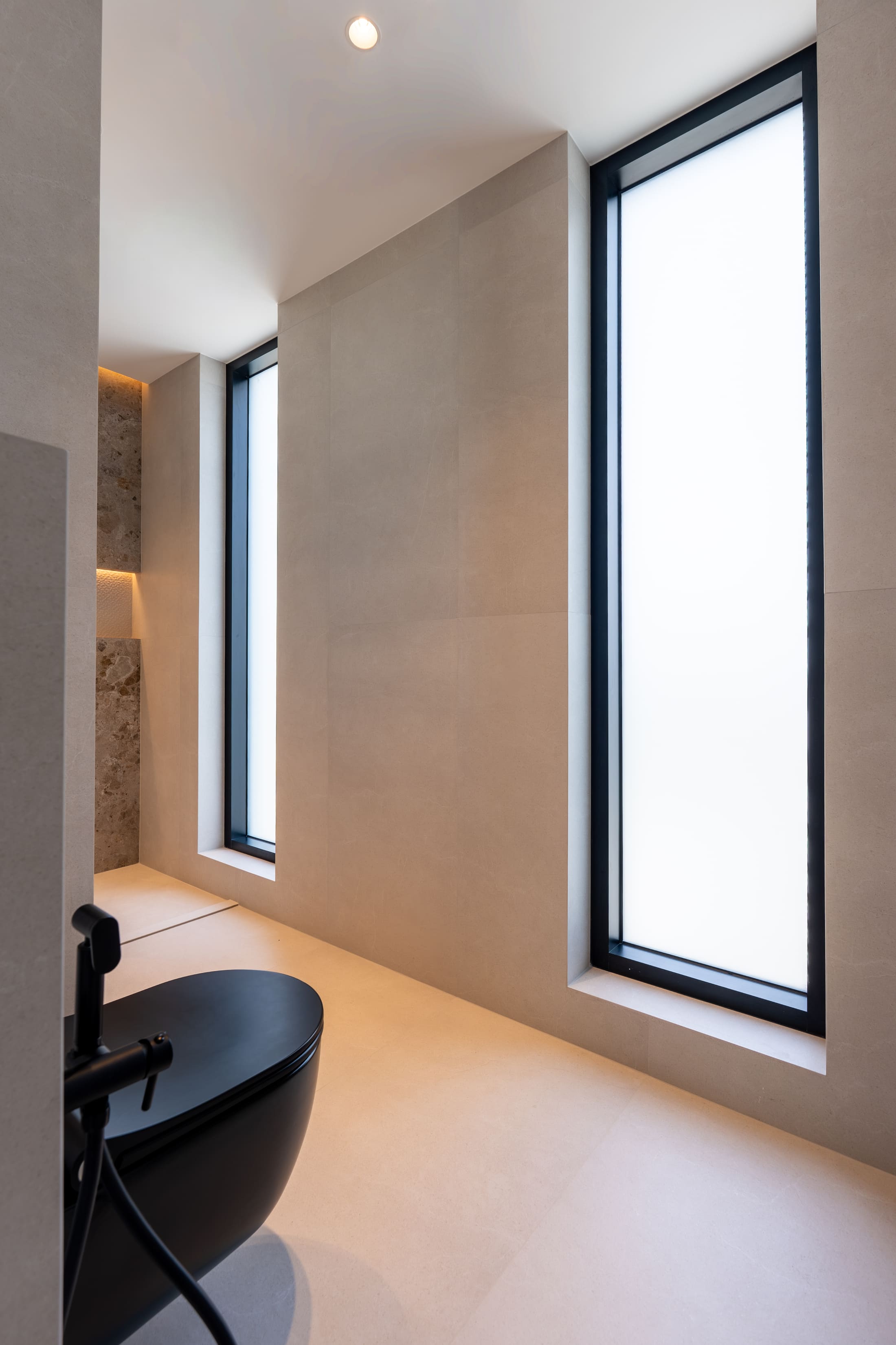 Image of a large villa with big glass windows