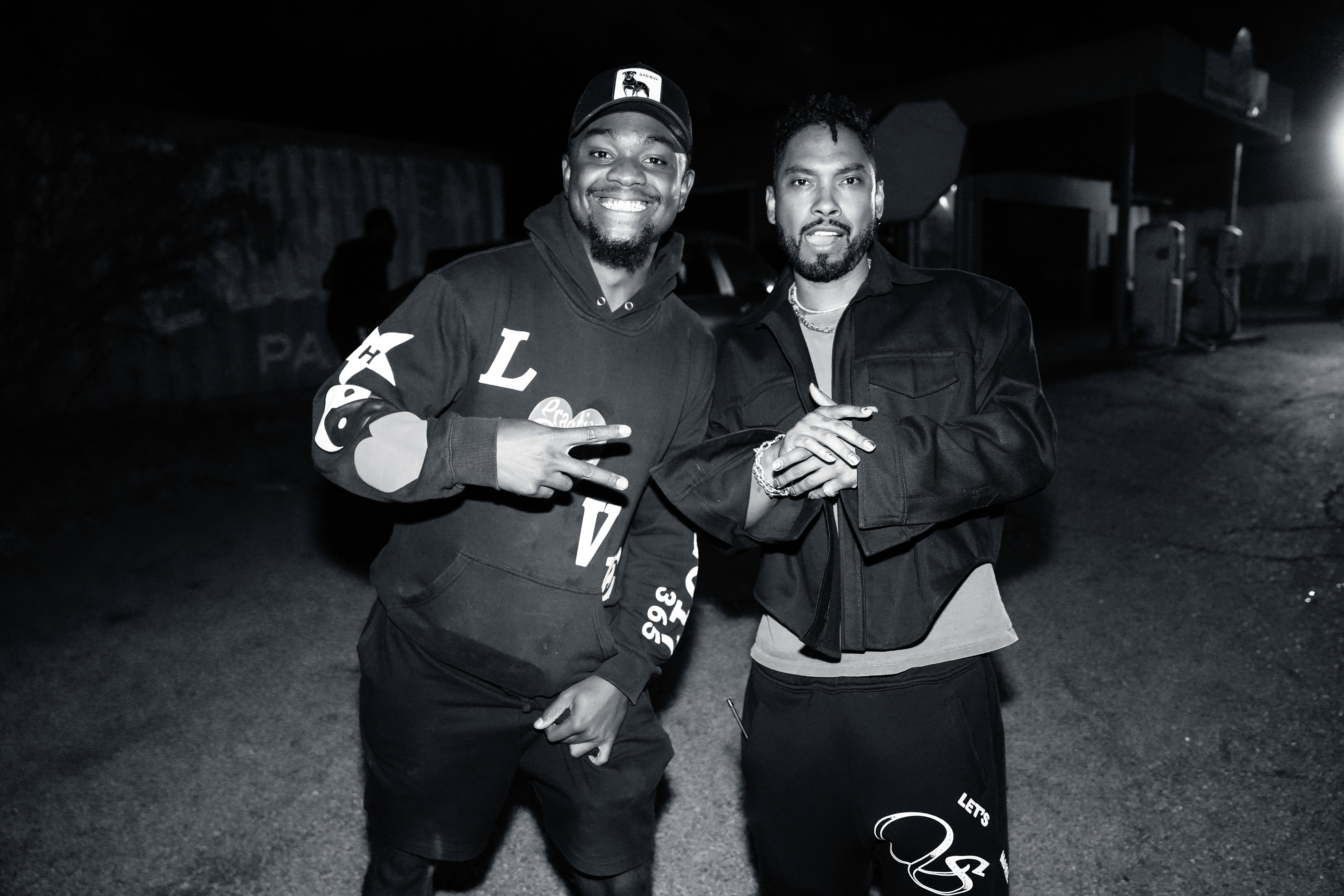 Black and white photo of man posing on camera