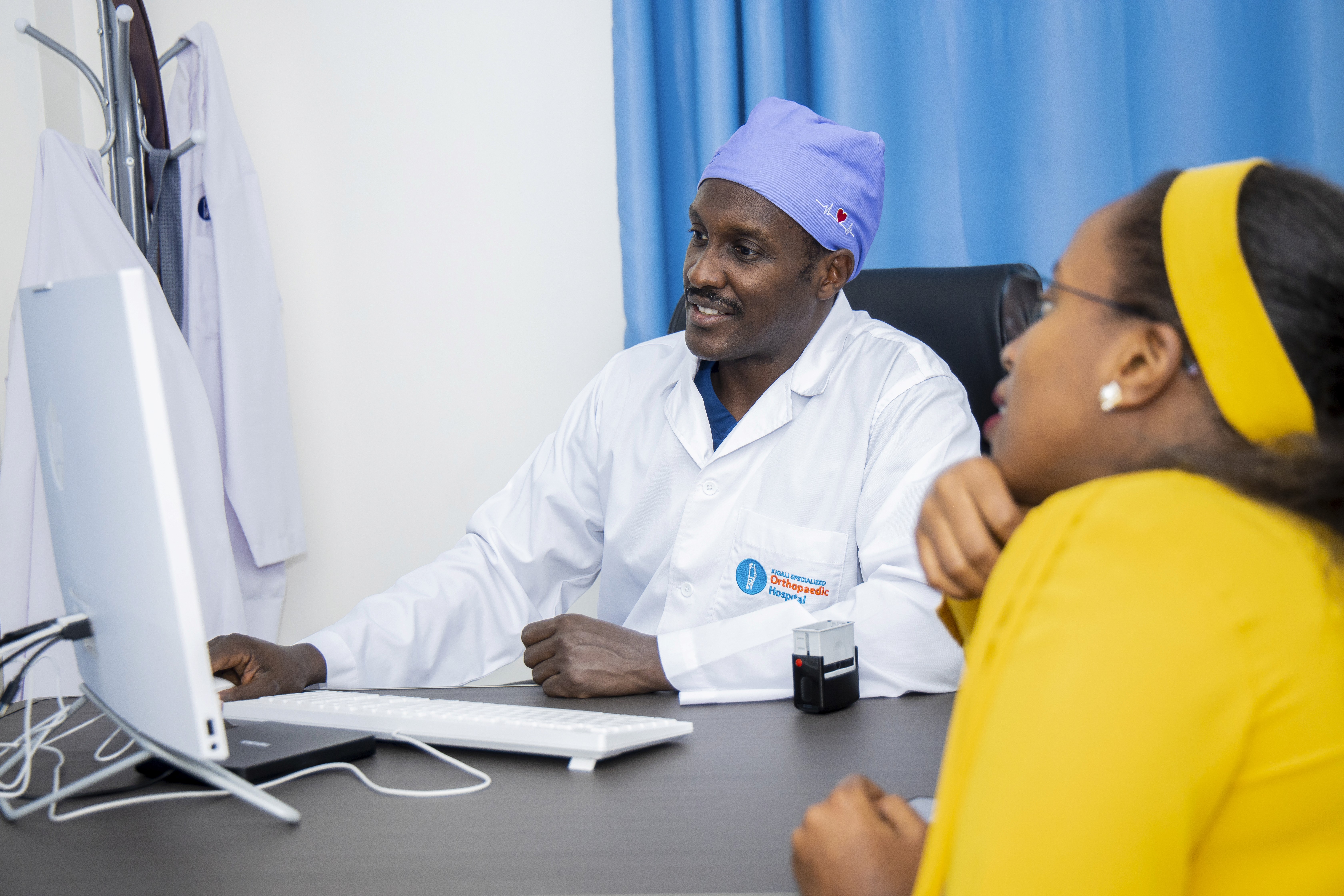 Doctor taking care of afro-american child