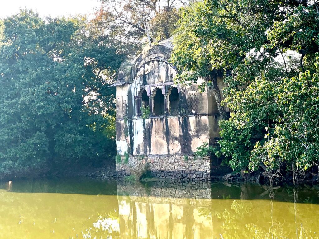 A hunting lodge on the banks of a lake.