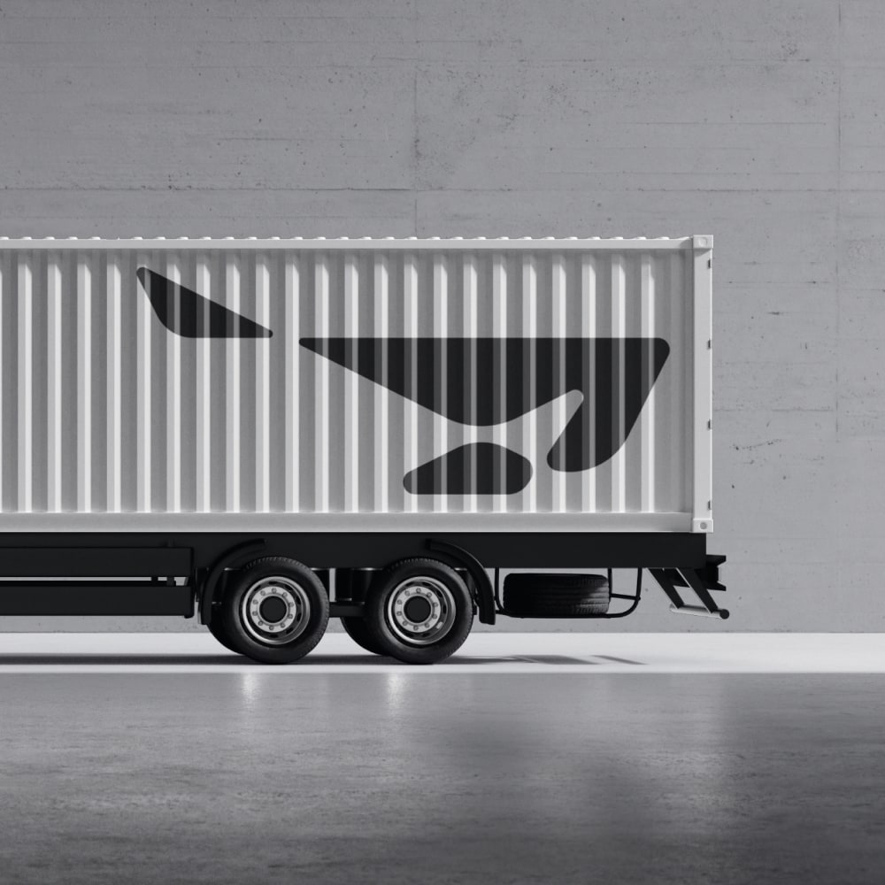 Onboarding screen for the Accident Guardian feature, showing white serif text over an aerial night photograph of a lone car on a motorway, with a Skip link in the top right corner.