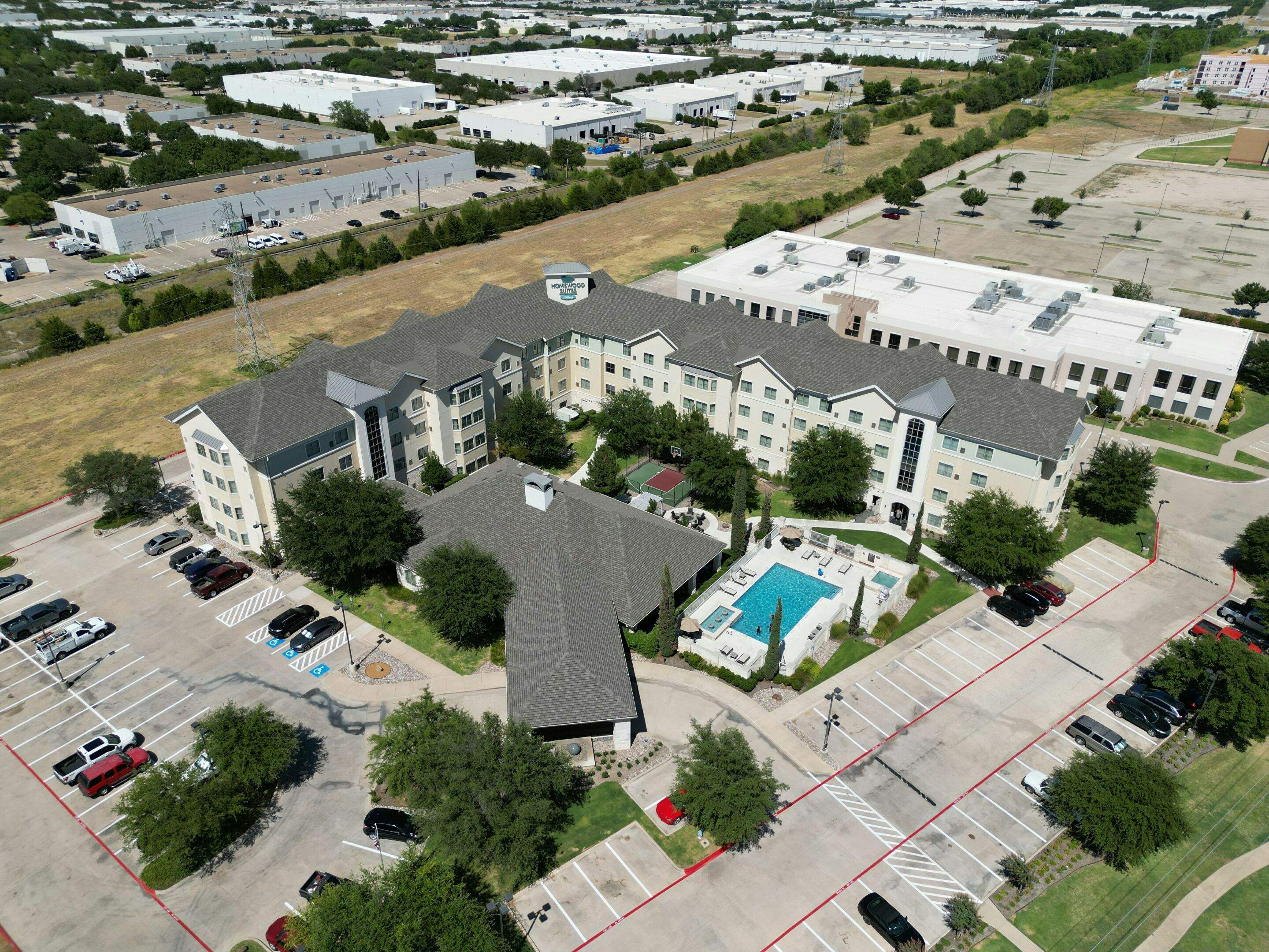 Dallas residential roofing project on modern home by trusted DFW roofer.