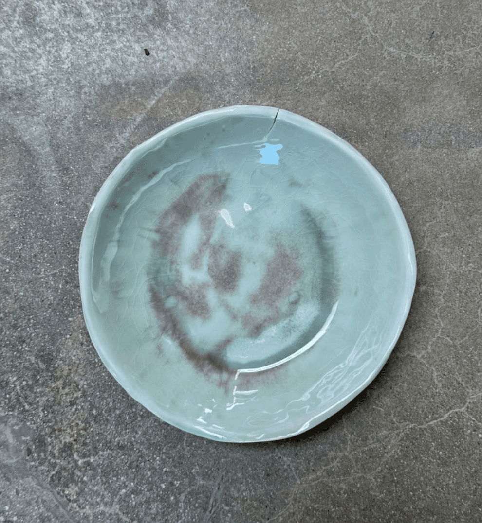 grayscale photo of woman wearing black spaghetti strap top