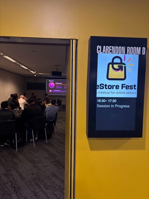  eStore Fest session in progress conference room