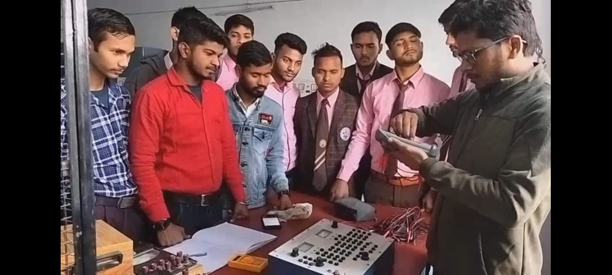 Full moon rising behind a house at night