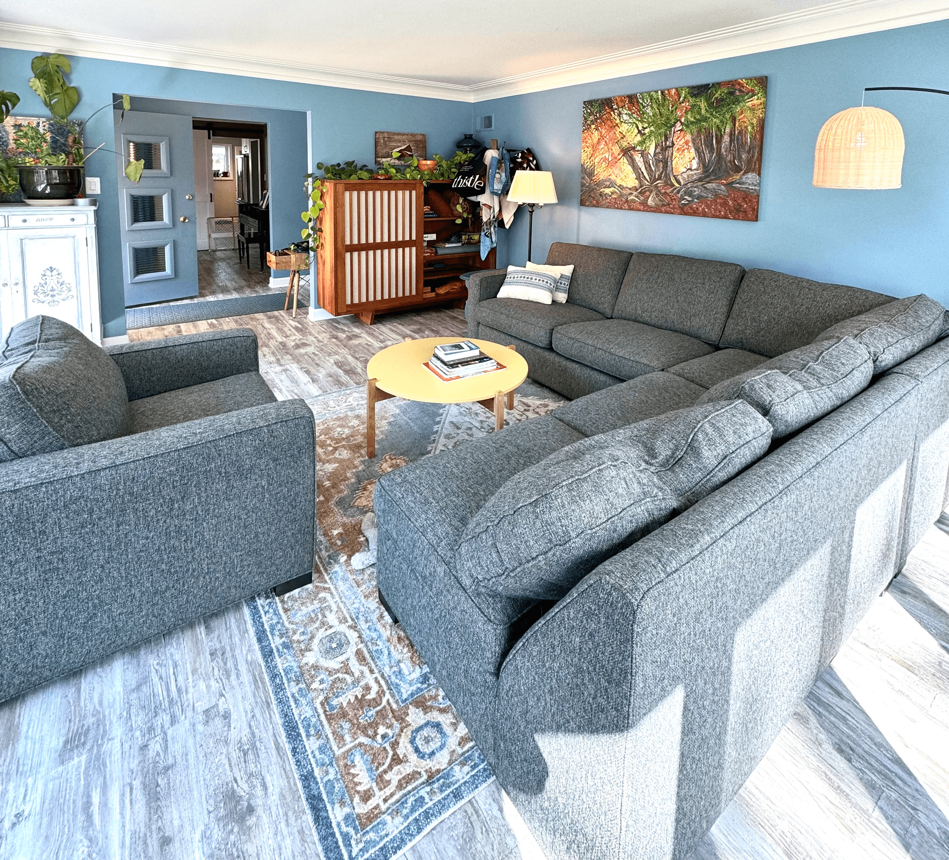 blue living room with sectional couch