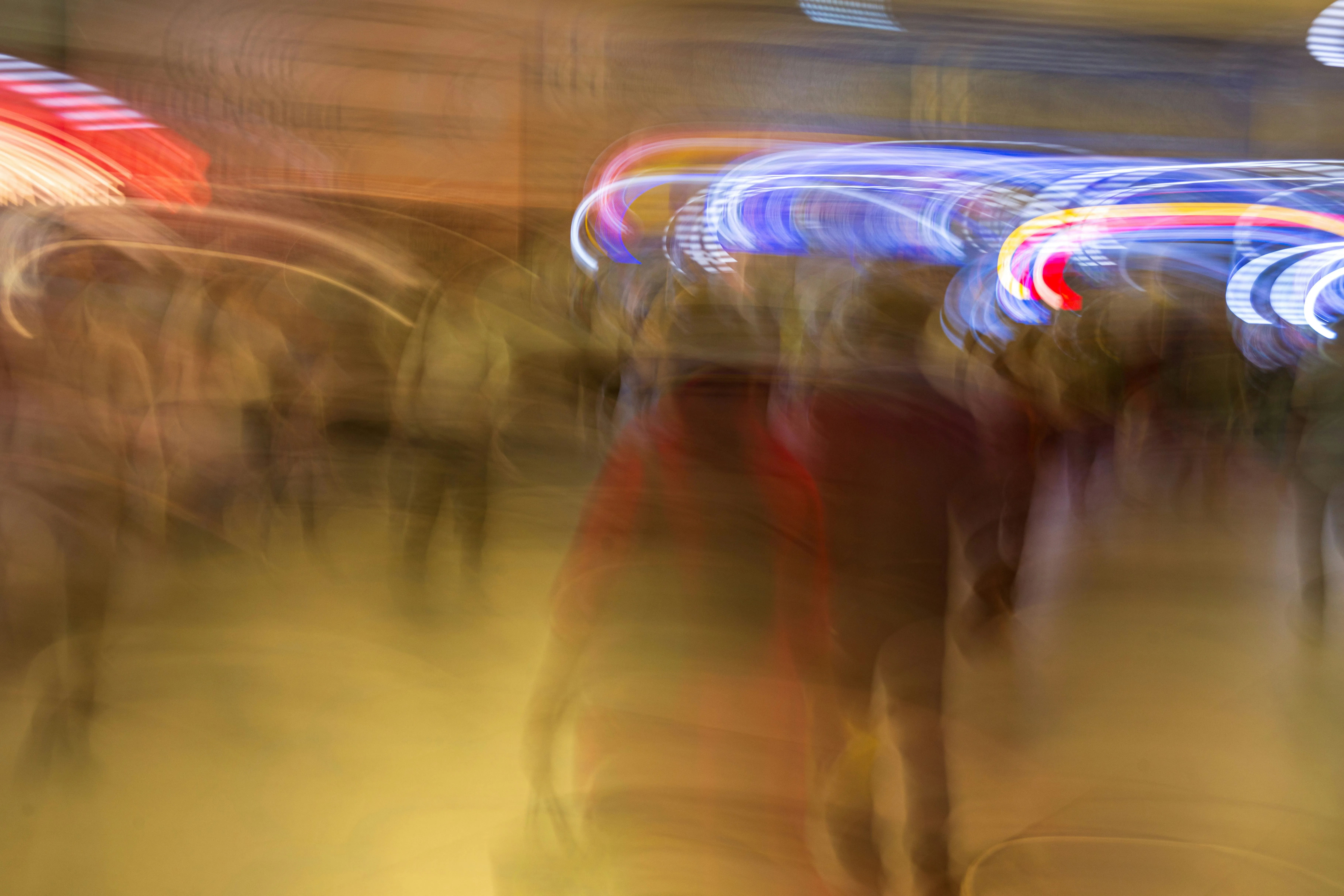 Abstract blurred streaks of colorful lights at night