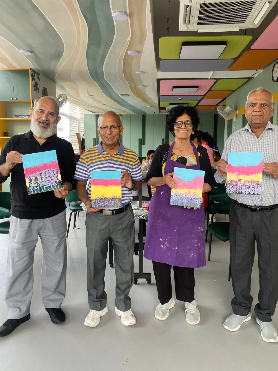 Members proudly displaying their artwork