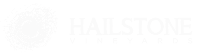 a white logo reading 'hailstone vineyards'