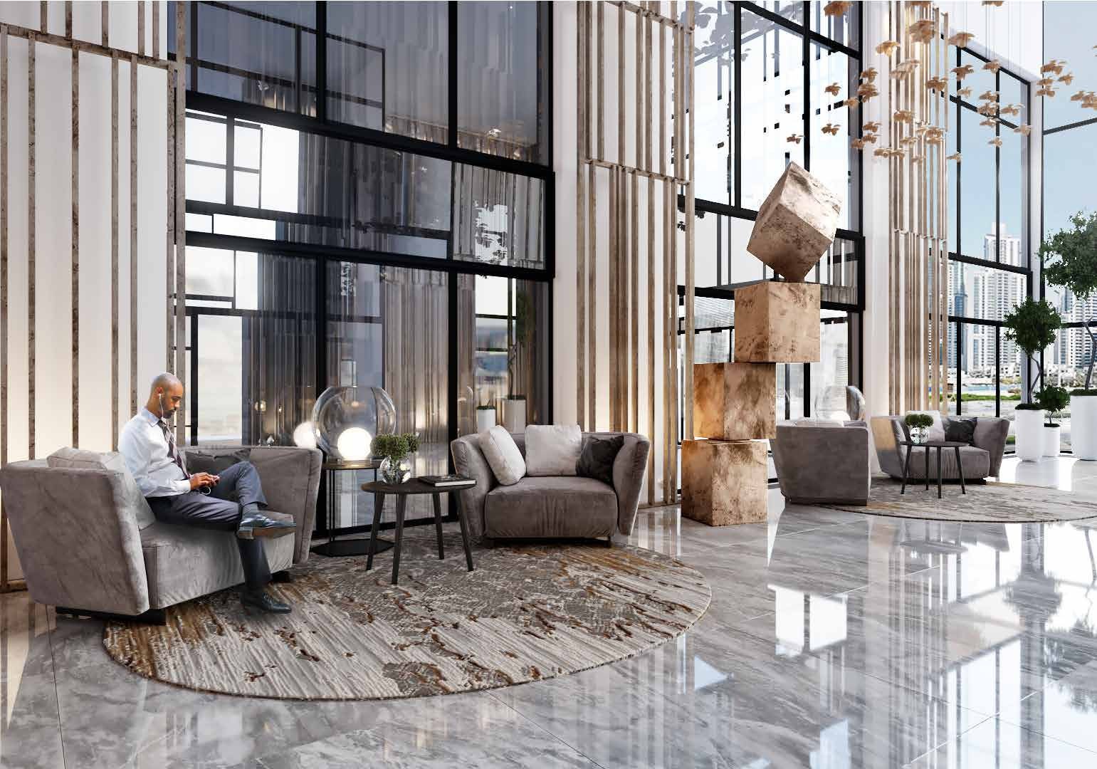 Modern lobby lounge with floor-to-ceiling windows, emphasizing professional real estate environments.