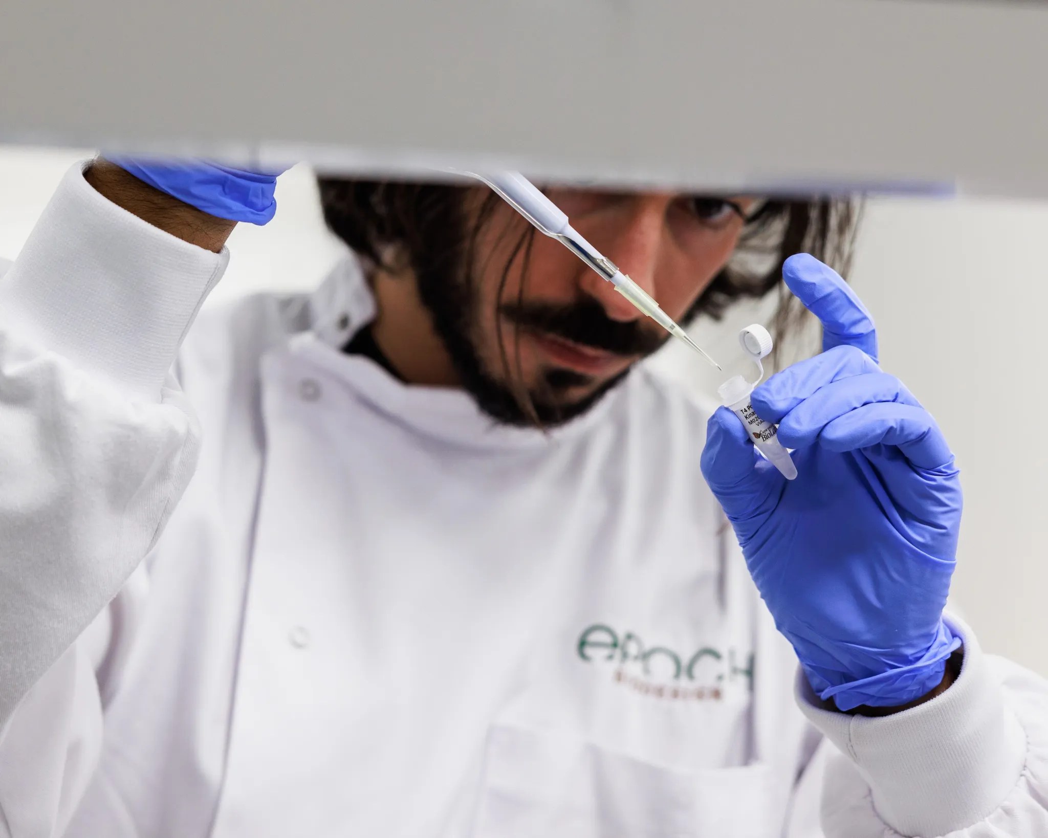 An Epoch Biodesign employee working in the lab