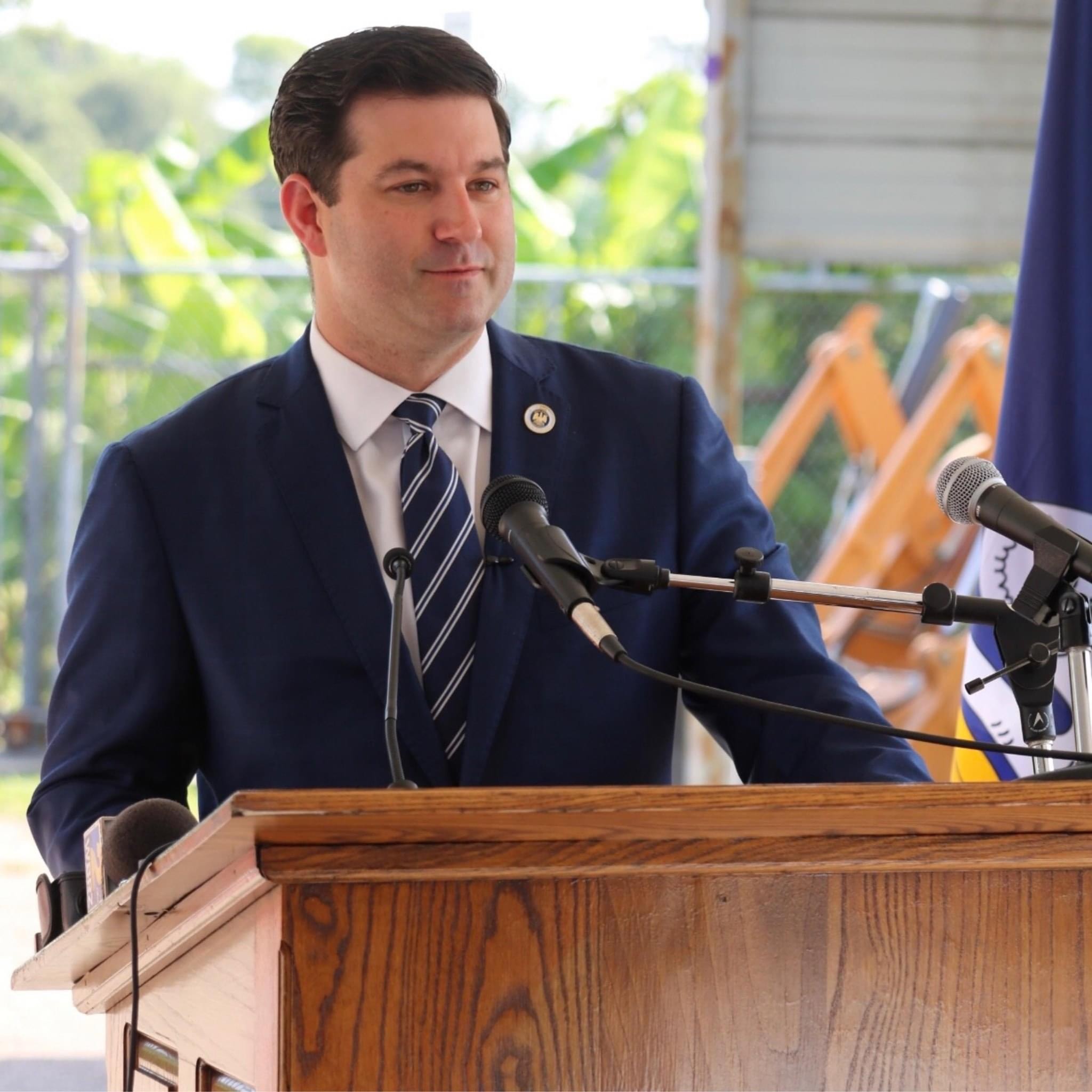 Rick Ward Speaking at a podium