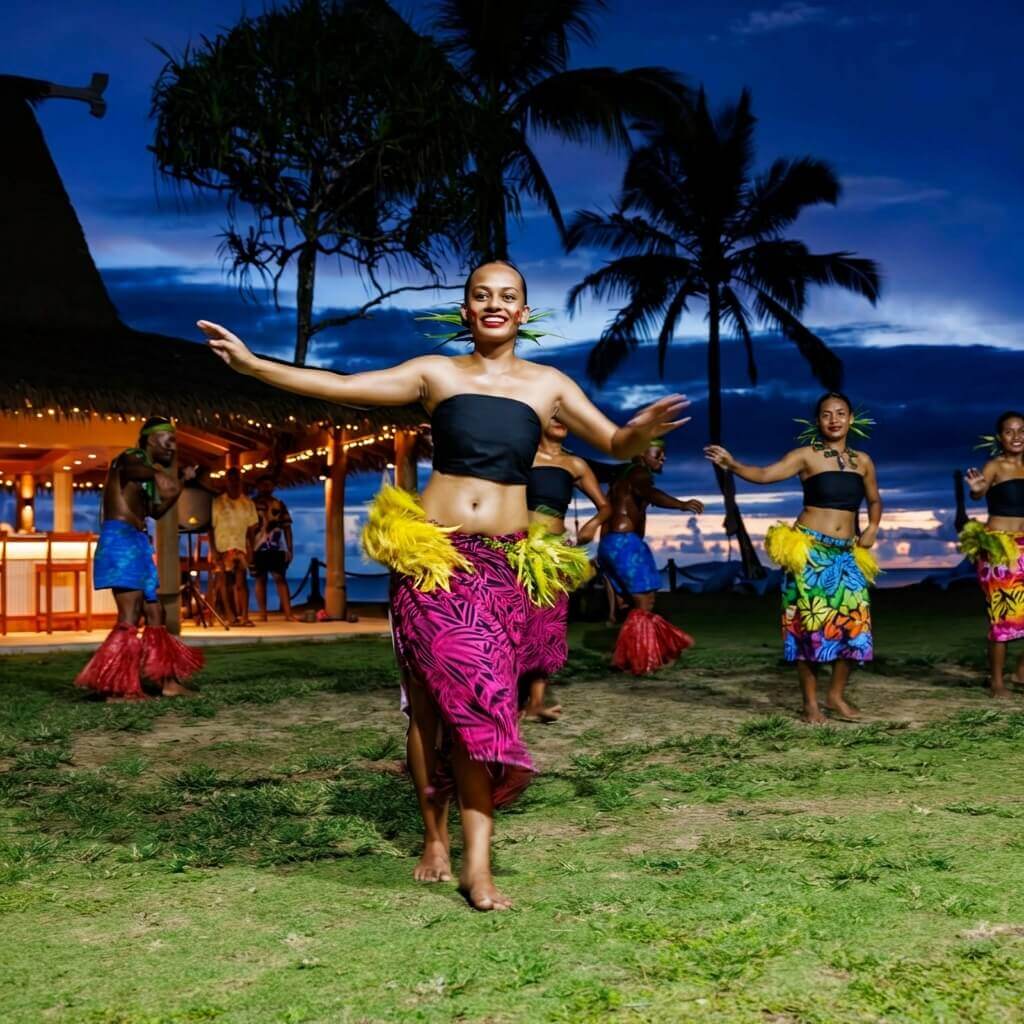 Ladies performing for guests at Uprising resort a traditional Fiji dance