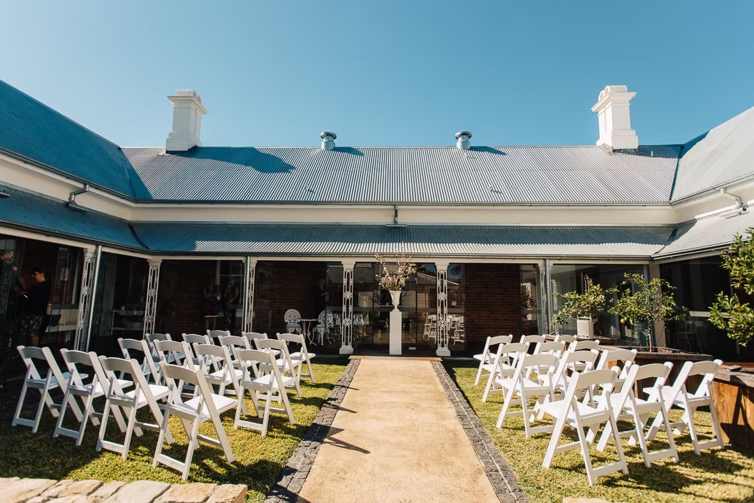 Wedding Ceremony in the outdoor event space of Hanworth House