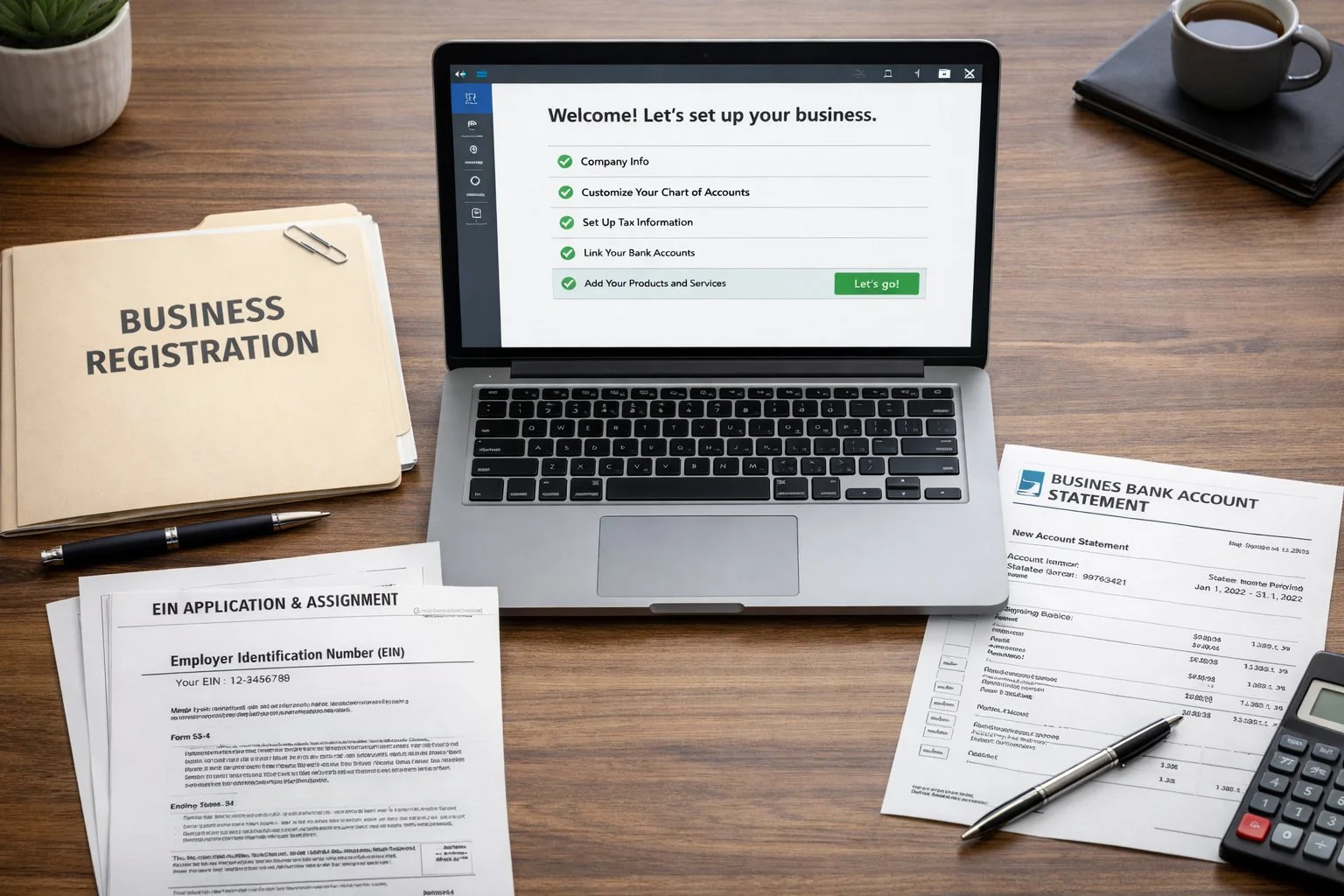 Clean office desk with a business registration folder, EIN documents, laptop showing accounting software setup, and a new business bank account statement.