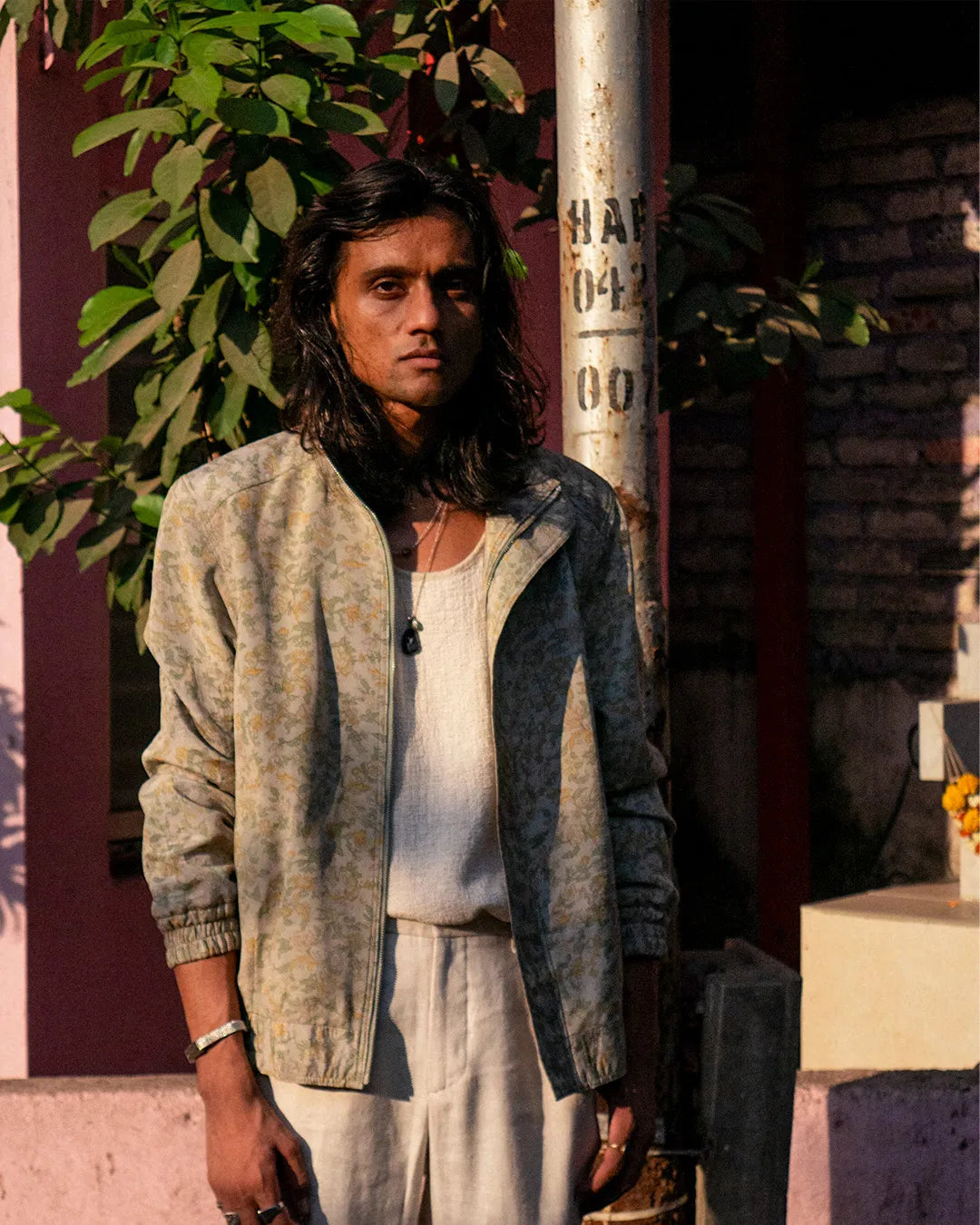 AKSA Bomber II is our printed silk bomber jacket, handcrafted by skilled artisans in-house using two one-of-a-kind vintage silk saree.