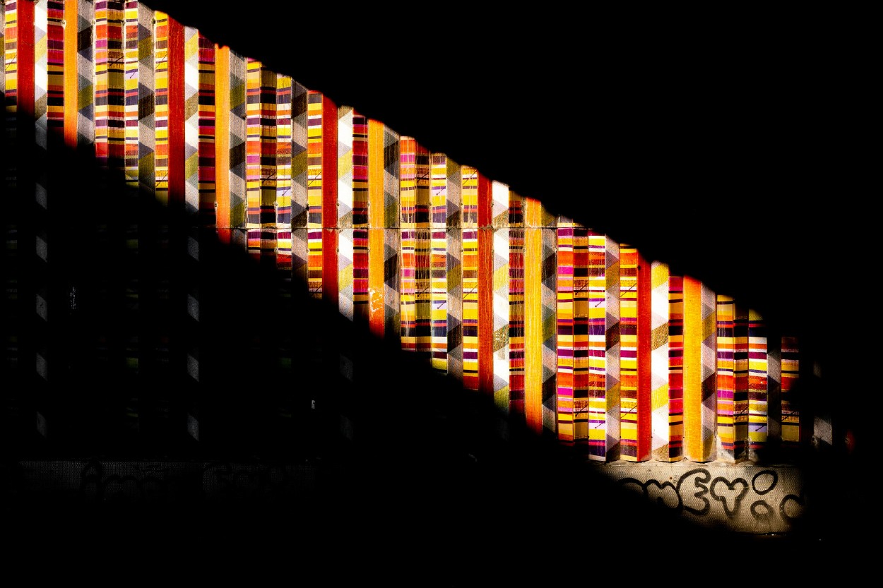 Sunlight hits a colourful building