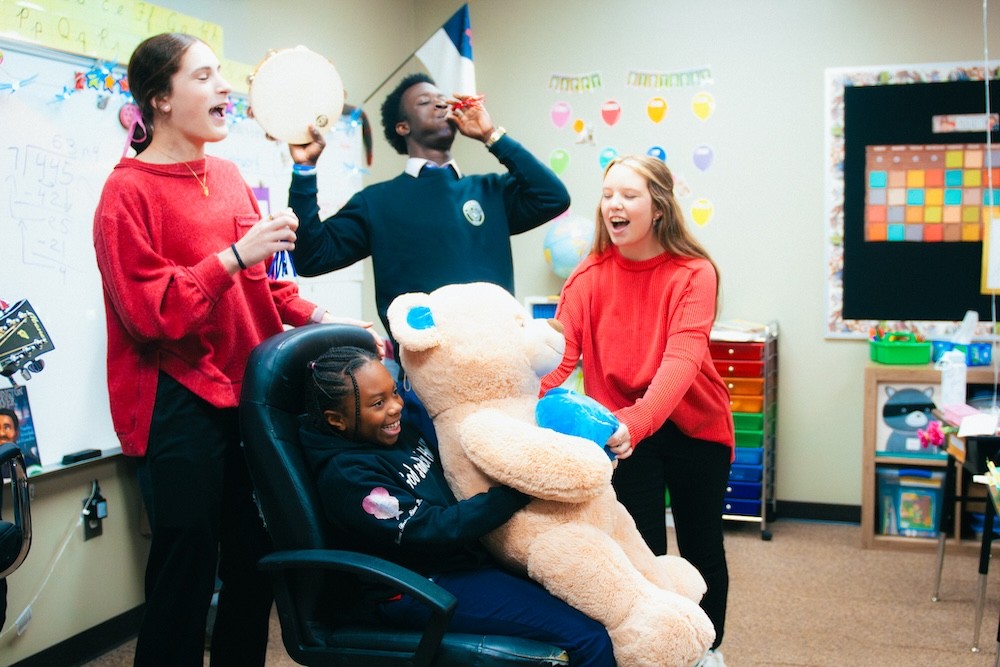 A student getting a singing telegram on Valentines Day