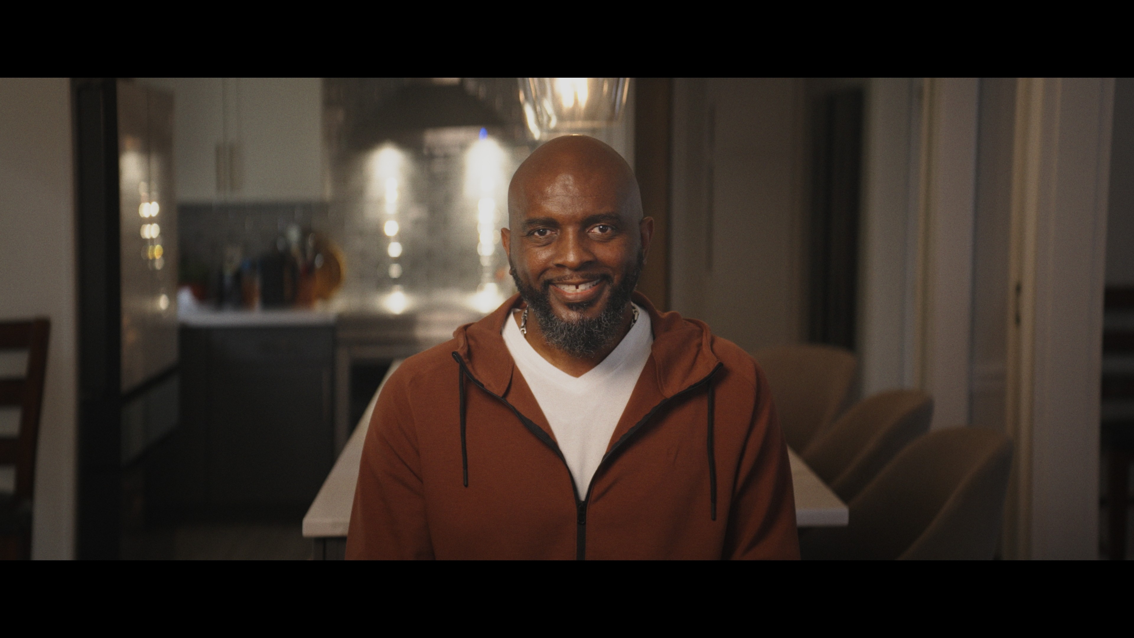 Front cover image for a short film made for BBC called Count me in. The image is a man smiling a looking towards the camera.