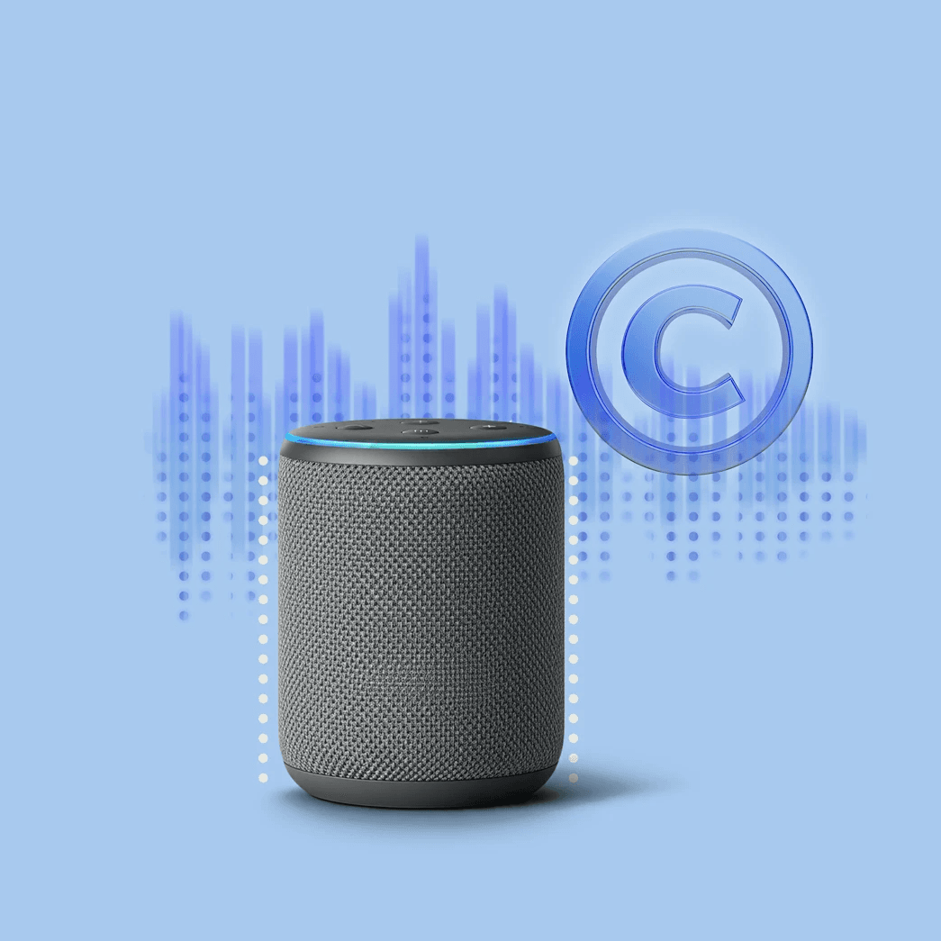 Altavoz inteligente gris con símbolo de copyright y ondas sonoras.