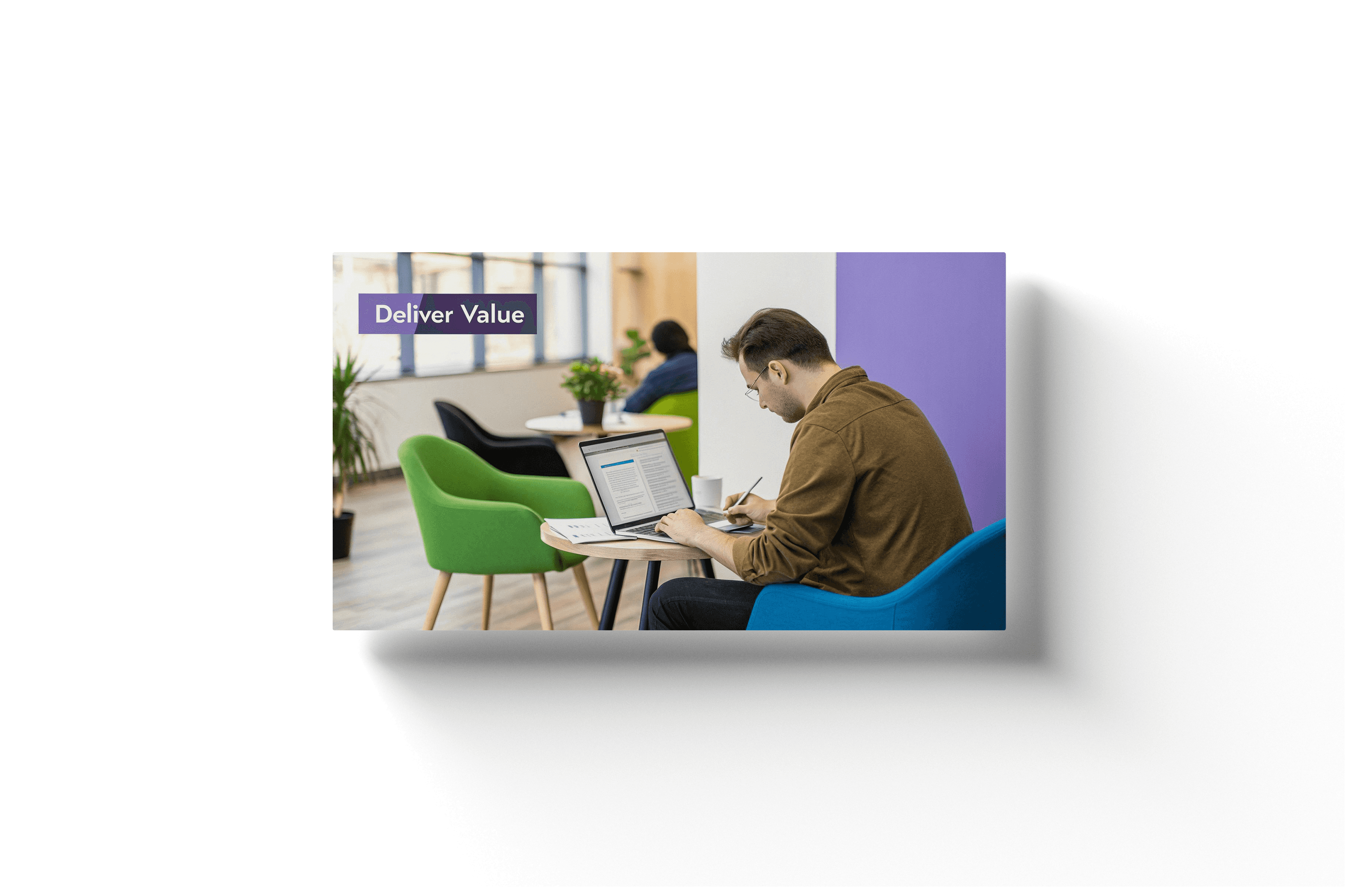 a man working on a laptop in a office setting with a purple box in the top left showing the text 'deliver value'