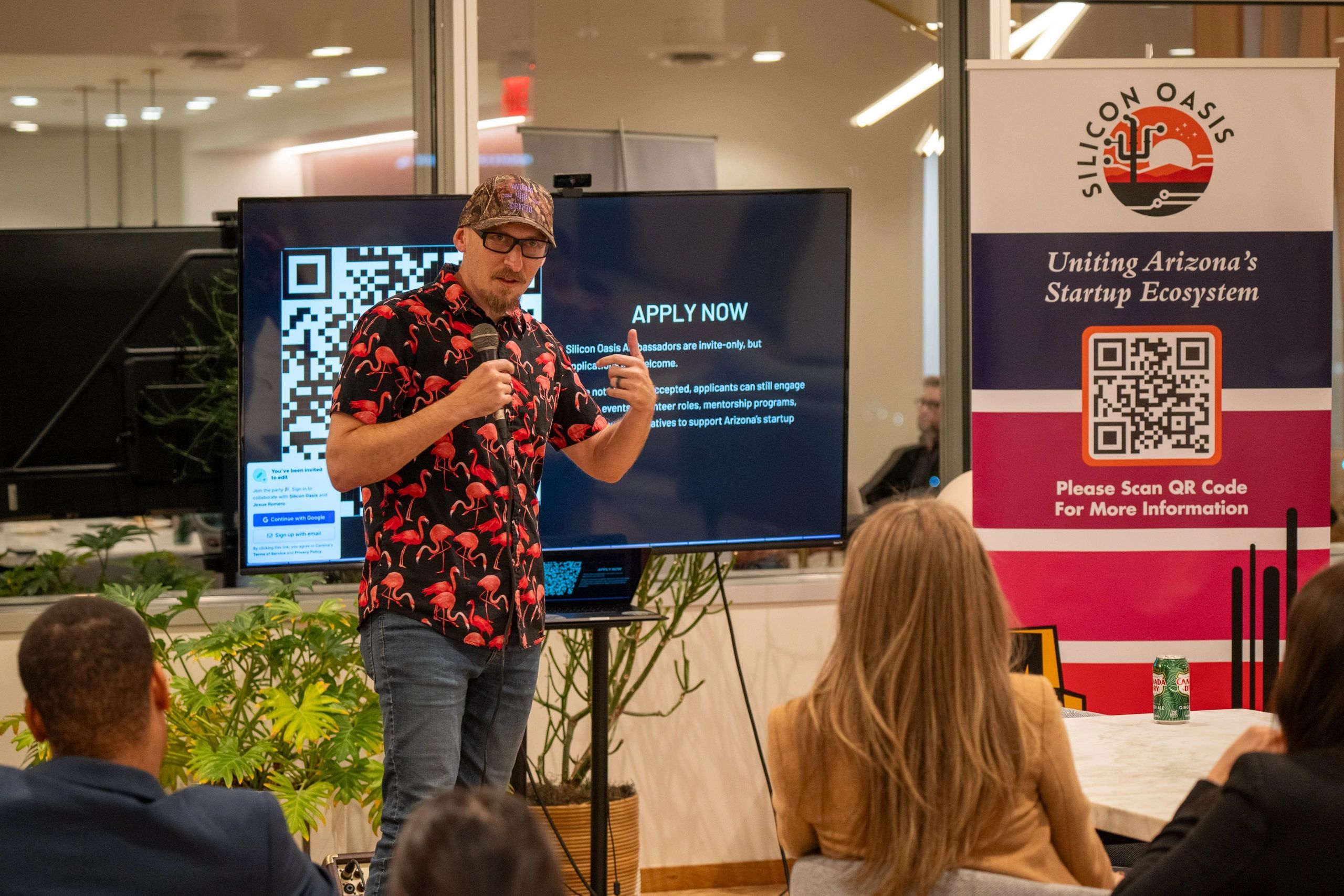 a black and white living room with a large tv