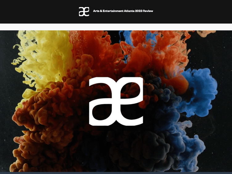 multicolor smoke behind the ae logo for arts and entertainment from downtown atlanta
