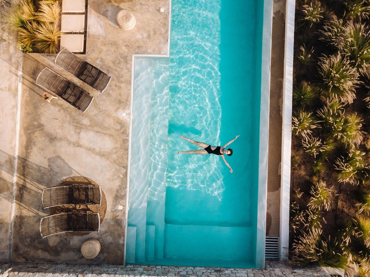 Exterior of a renovated Cypriot property by Wisdom Construction with a swimming pool