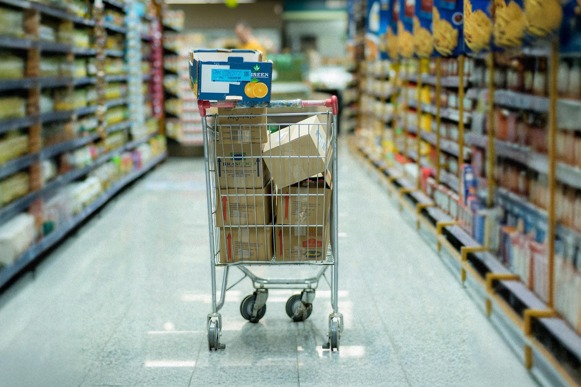 Cover image for blog on shopping cart abandonment reasons and solutions, illustrating customers leaving checkout with carts and highlighting ecommerce conversion challenges