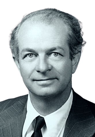 Chemist and two-time Nobel laureate Linus Pauling is shown in this black-and-white portrait, wearing a suit and tie with a confident expression. Known for his groundbreaking work in chemical bonding and molecular biology, Pauling’s research laid the foundation for quantum chemistry and he was also a prominent advocate for nuclear disarmament and humanitarian causes.