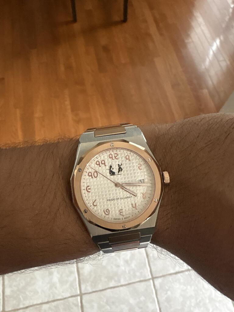 round silver-colored Rolex analog watch with link band