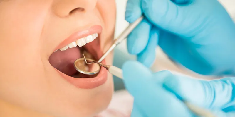Patient receiving a general dentistry examination
