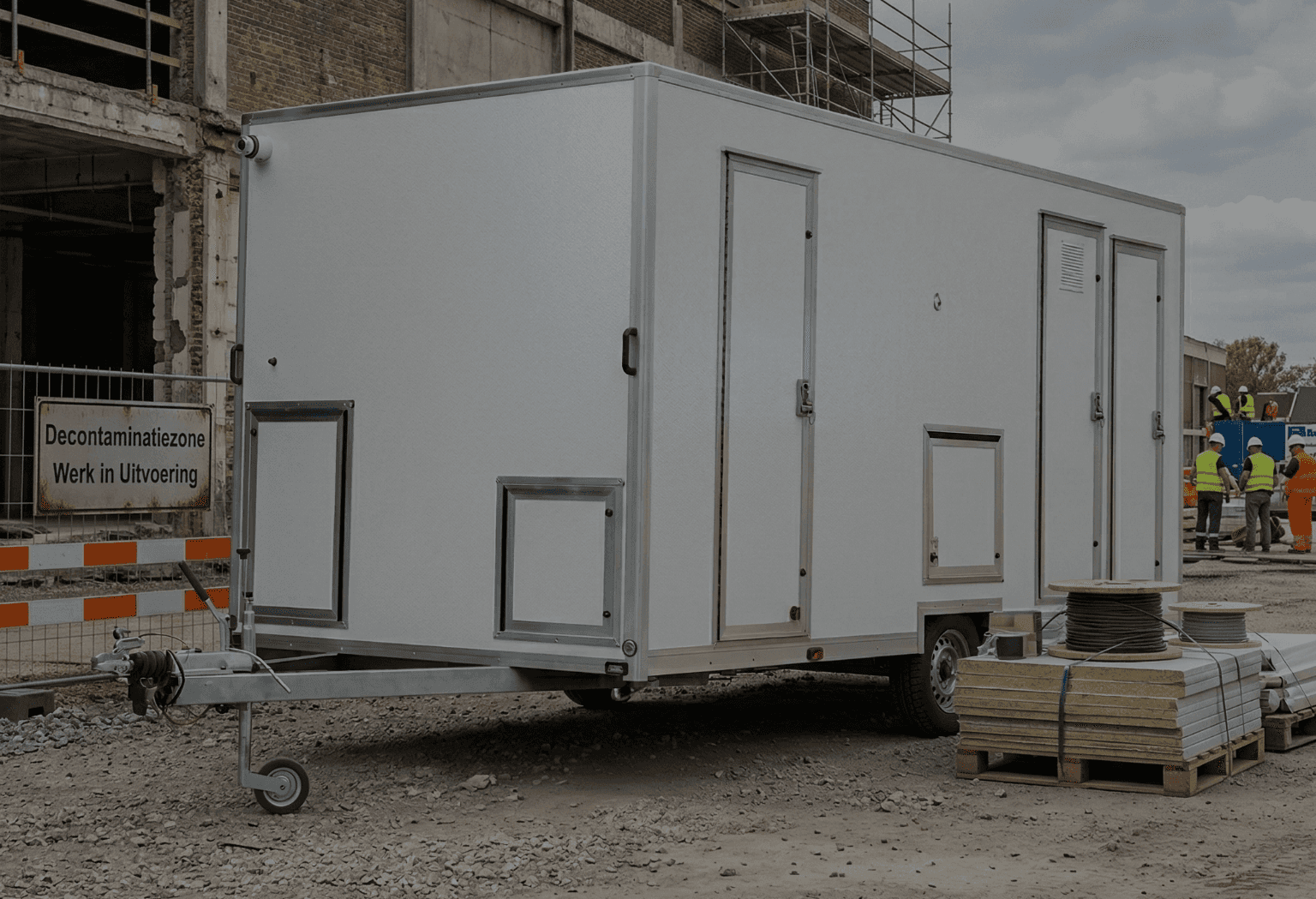 Close-up of hands adjusting green, cream, and orange Trailblaze Runner sneakers with bold sole design, worn on a textured red track surface.