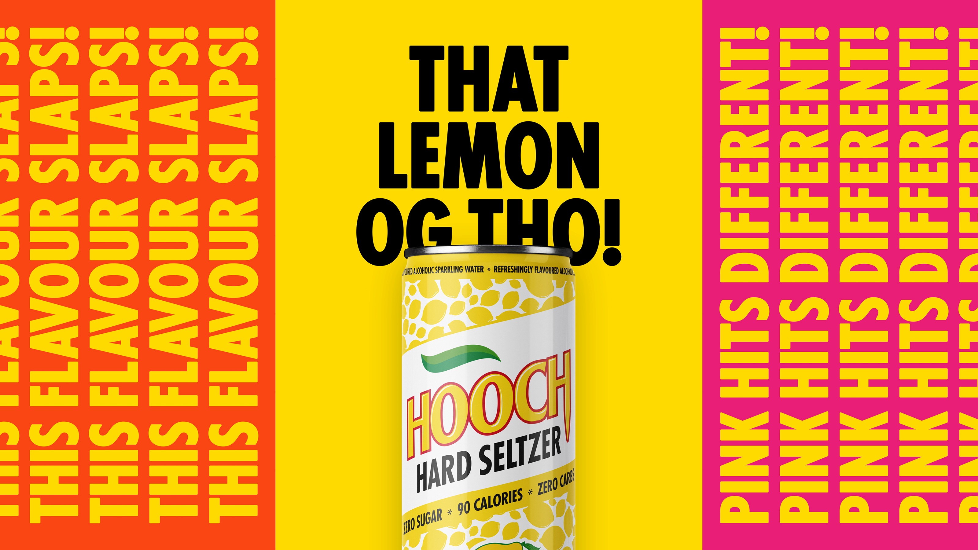 Person wearing black clothing carrying a black tote bag with a green globe-like geometric symbol, standing against a concrete wall in sunlight and shadow.