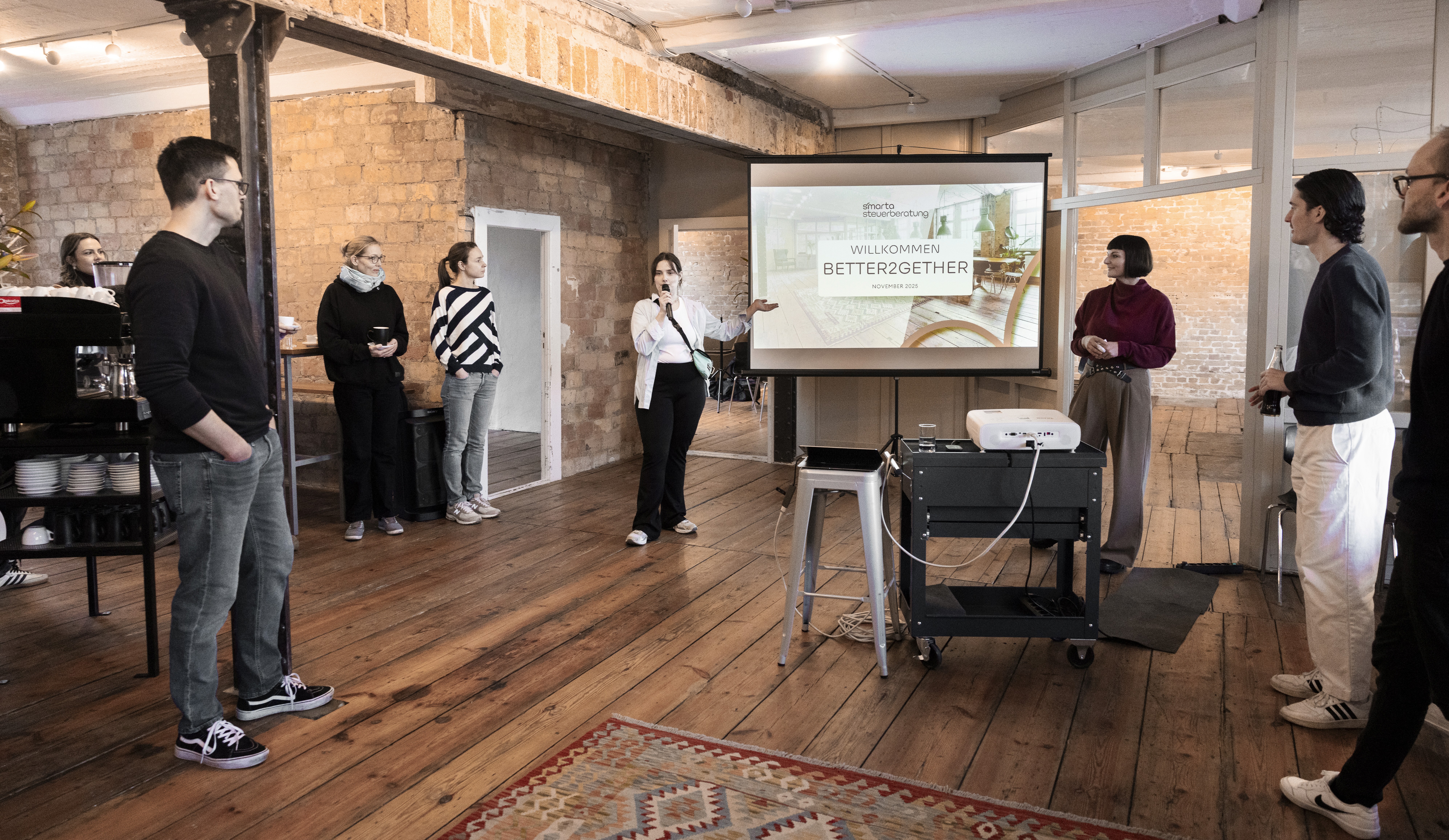 man in blue dress shirt and woman in black long sleeve shirt