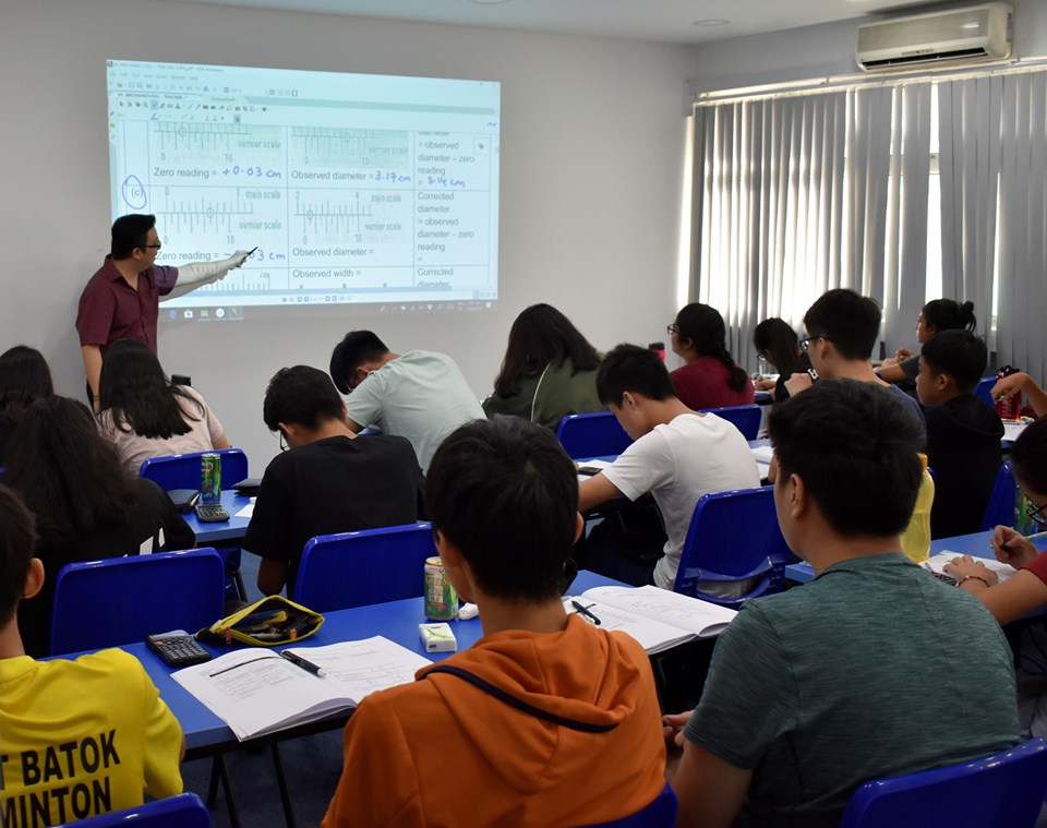 Students concentrating during lessons at Physics Academy