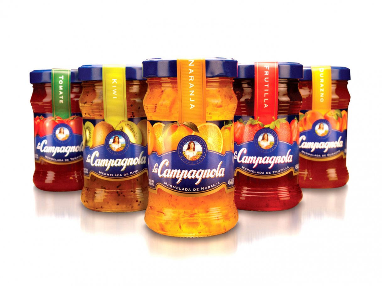 Rooftops of a coastal town with the sea in background