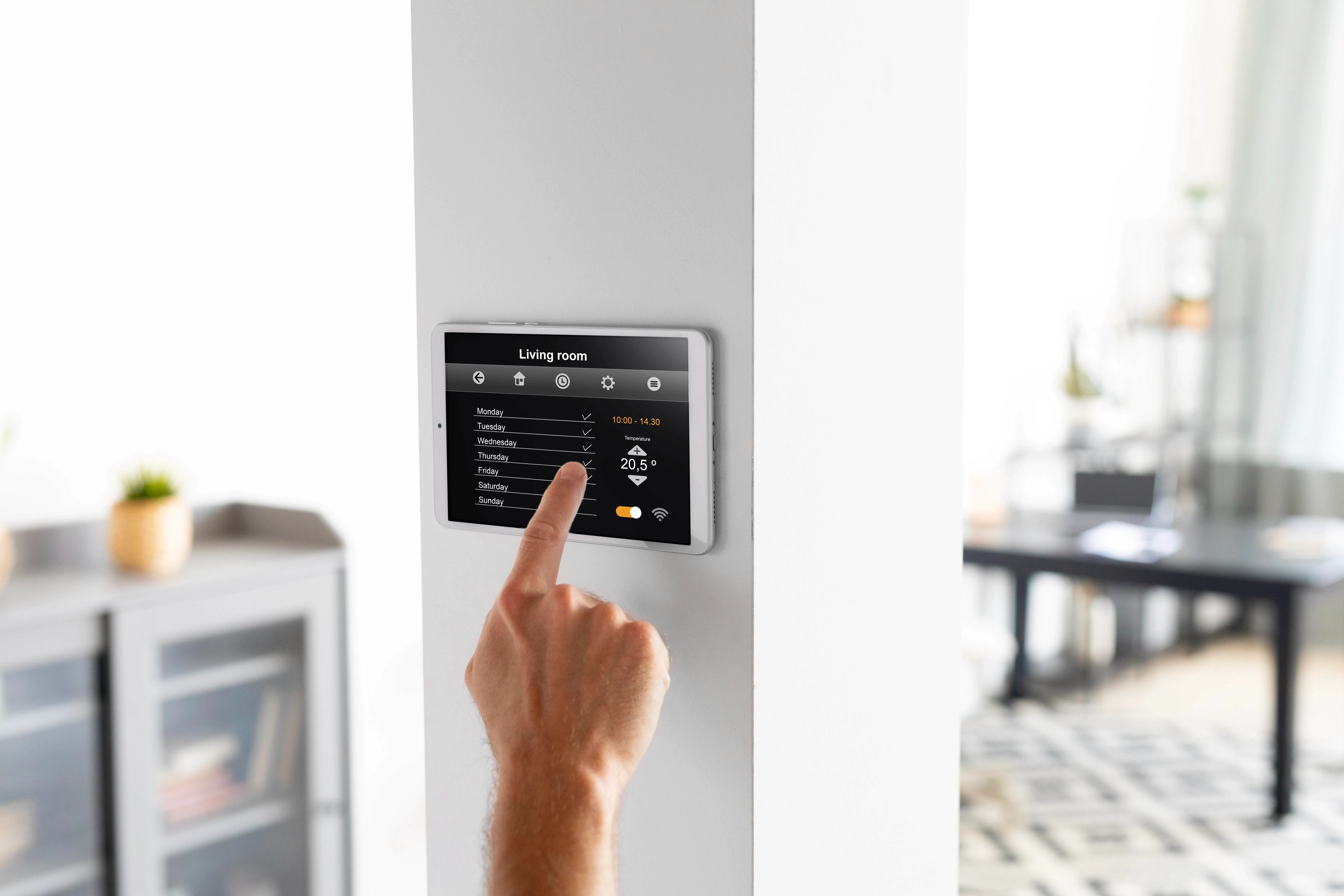 man-using-tablet-his-smart-home
