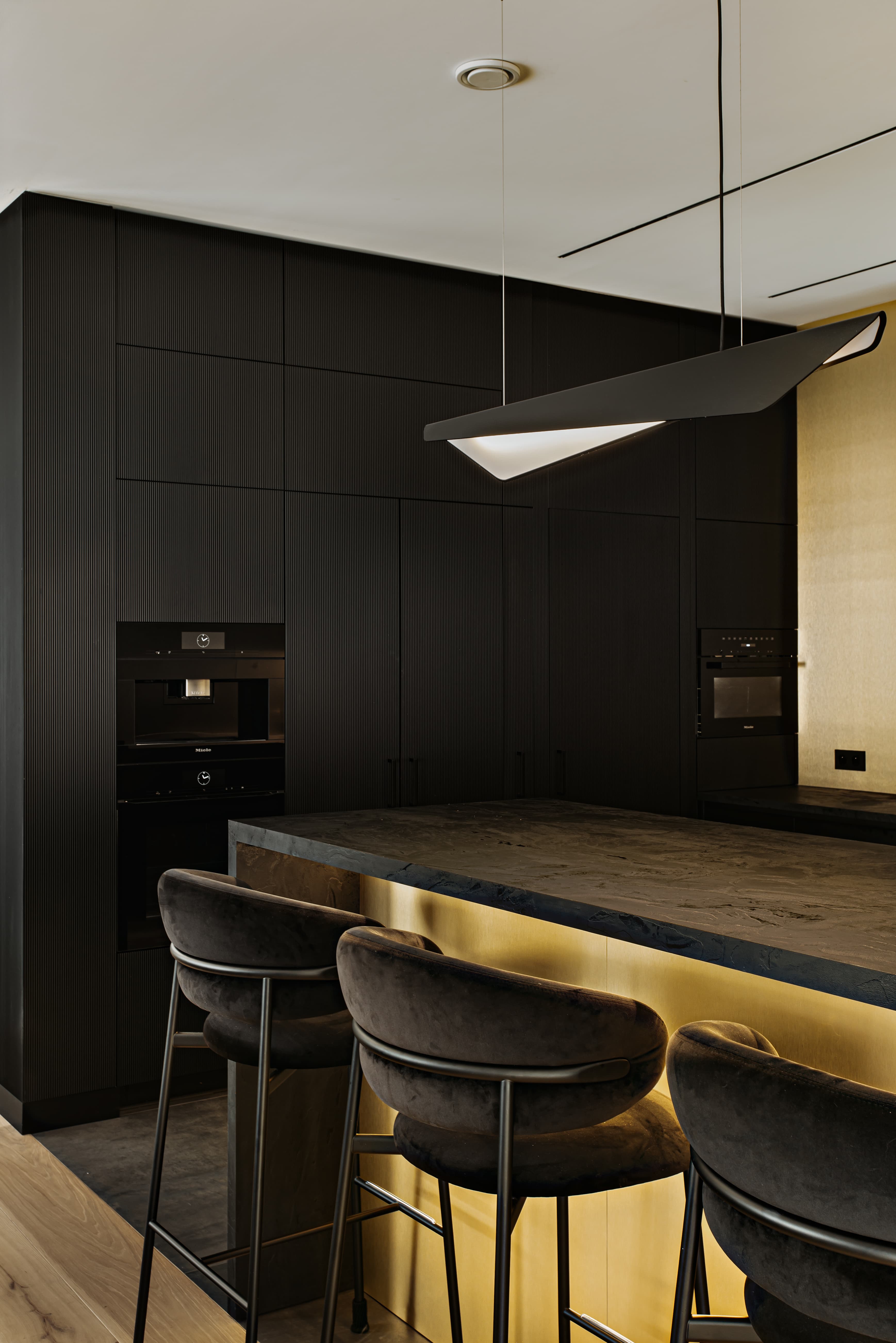 gold and black kitchen