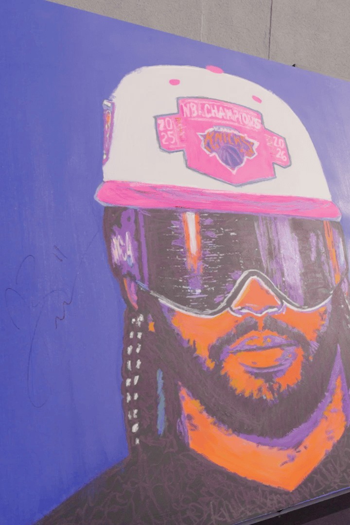 Artwork of Jalen Brunson displayed at the 2026 Charity Golf Classic.