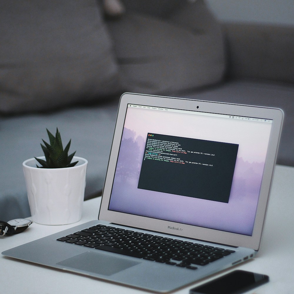 Laptop displaying website code