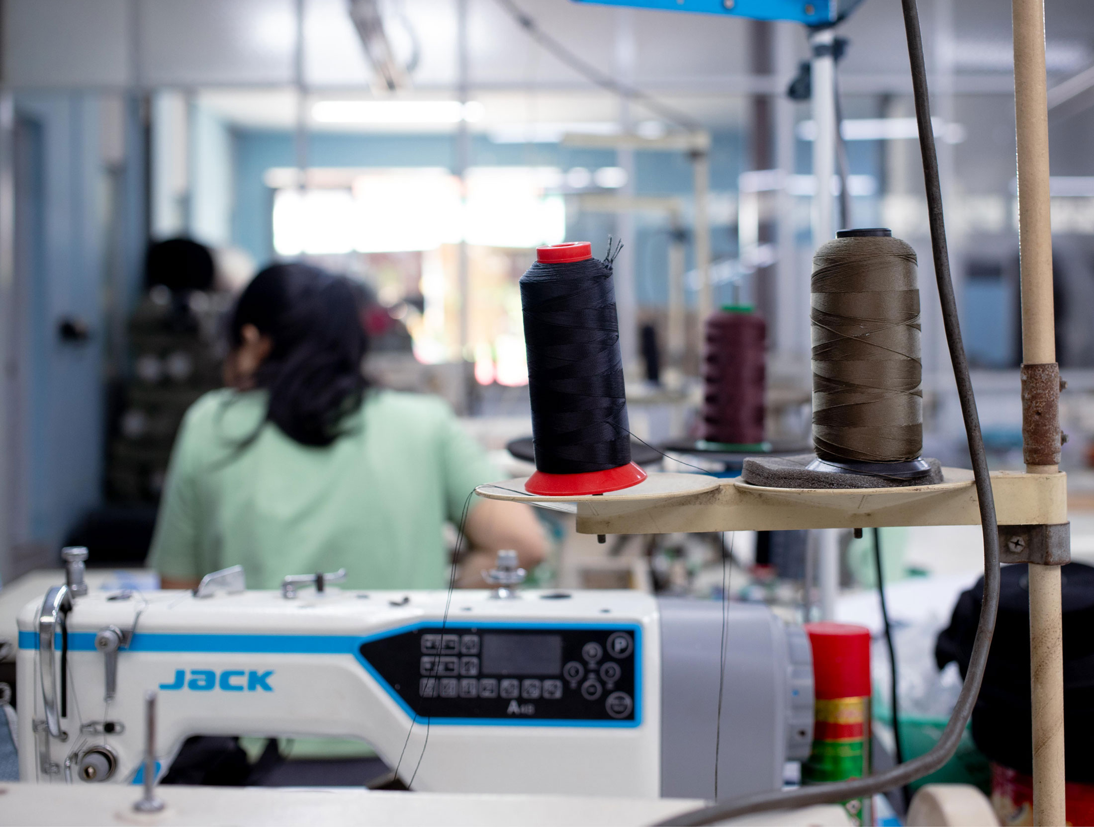 Detail shot: precision stitching on laptop sleeve