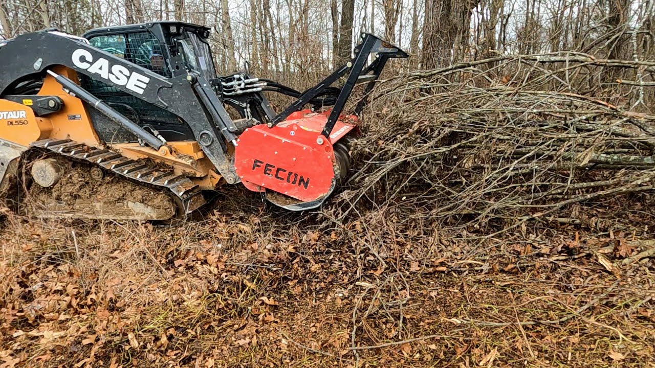 truck multching a pile of branches 