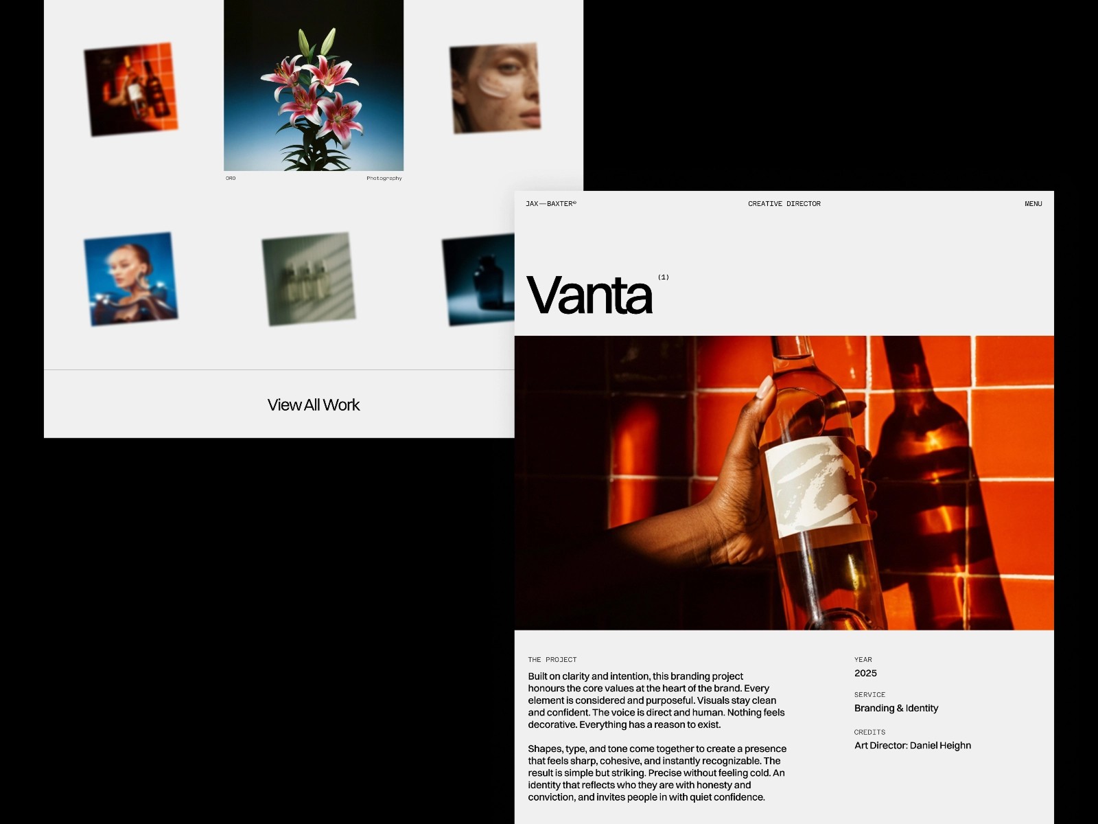 Hand holding a wine bottle against a vibrant red-tiled wall.