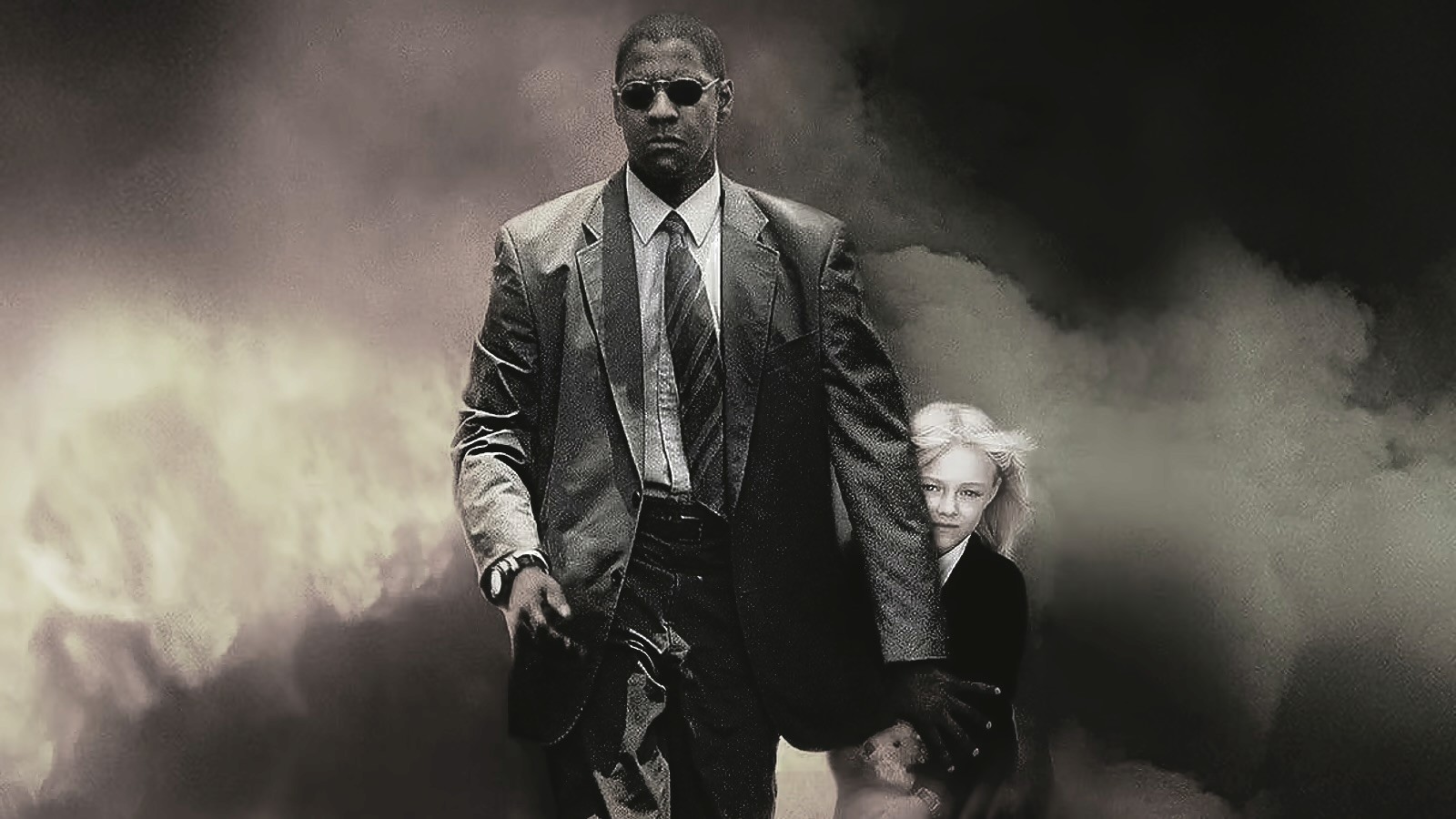 Promotional still from the movie Man on Fire, featuring a suited bodyguard(Denzel Washington) with sunglasses, walking protectively with a young girl behind him holding a Teddy Bear. The background is filled with dark smoke and fire, creating an intense and dramatic atmosphere. The bodyguard’s determined expression and strong posture convey a sense of duty, security, and vengeance. 