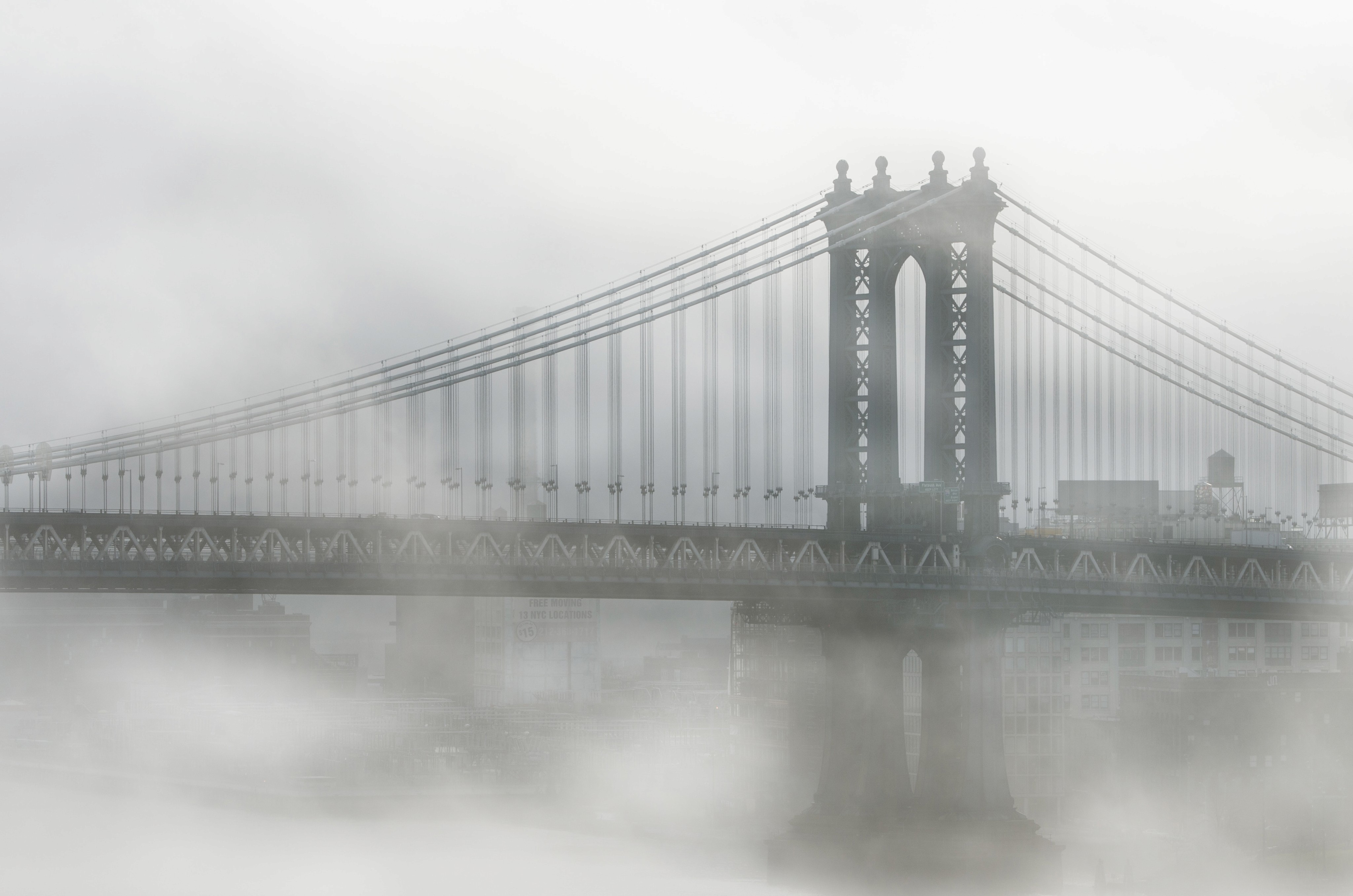 Fog over Brooklyn Bridge