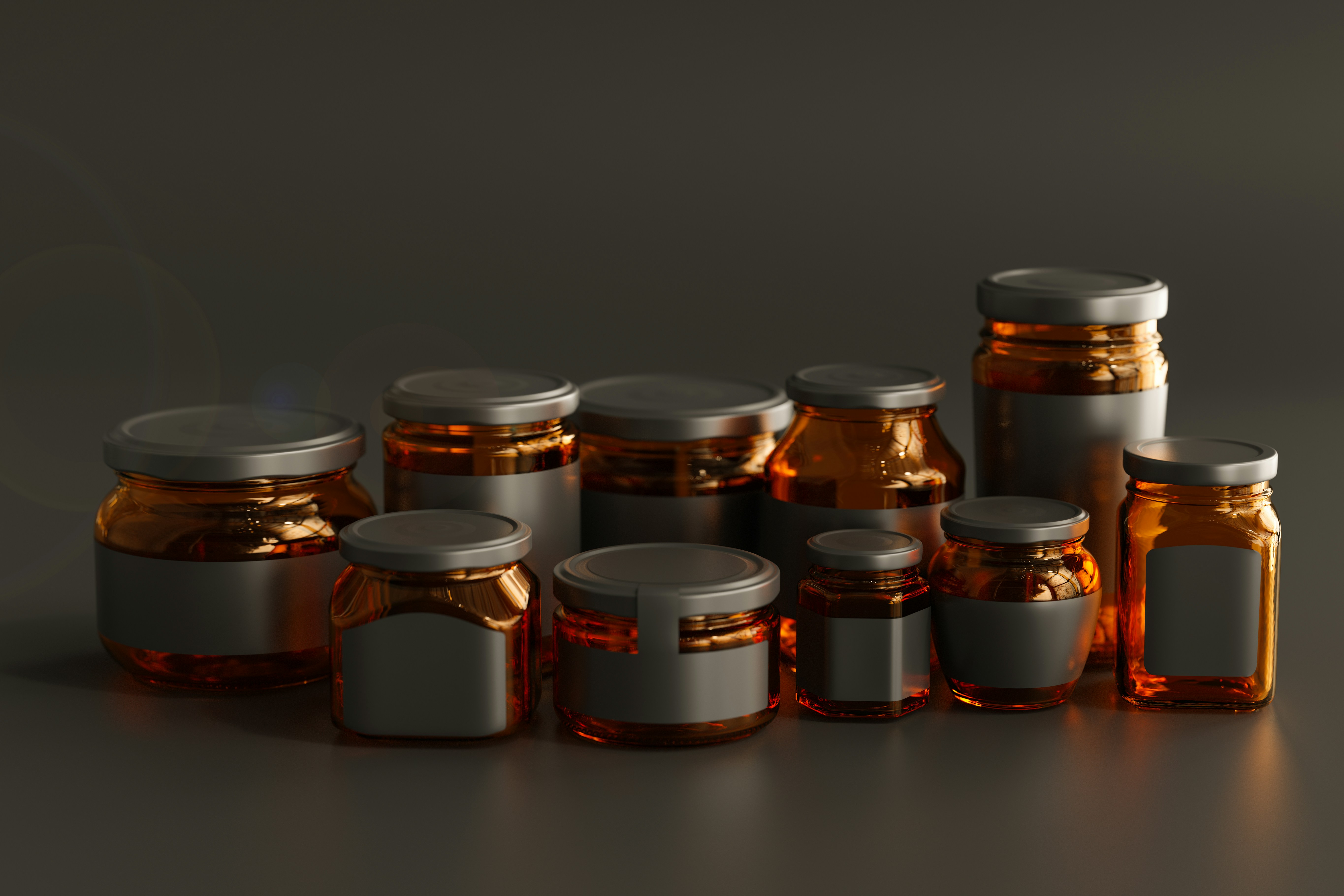 a group of jars with lids on a table