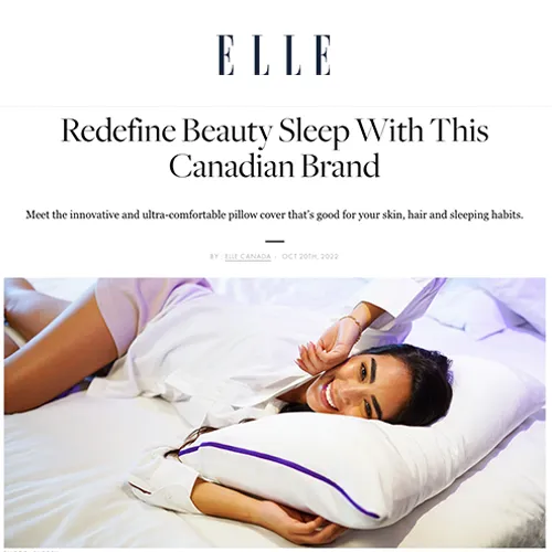 A hero shot of the woman in a bed on an article in Elle