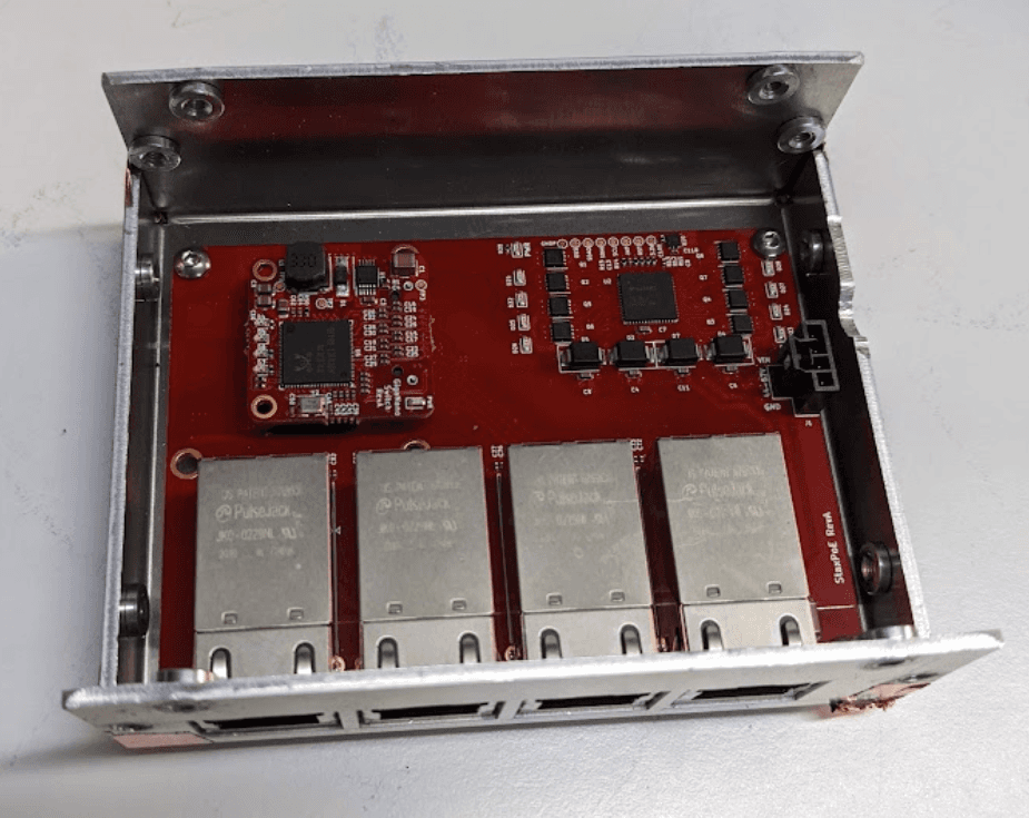 Custom aluminium chassis housing GigaBlox Nano and the PoE board with four RJ45 ports