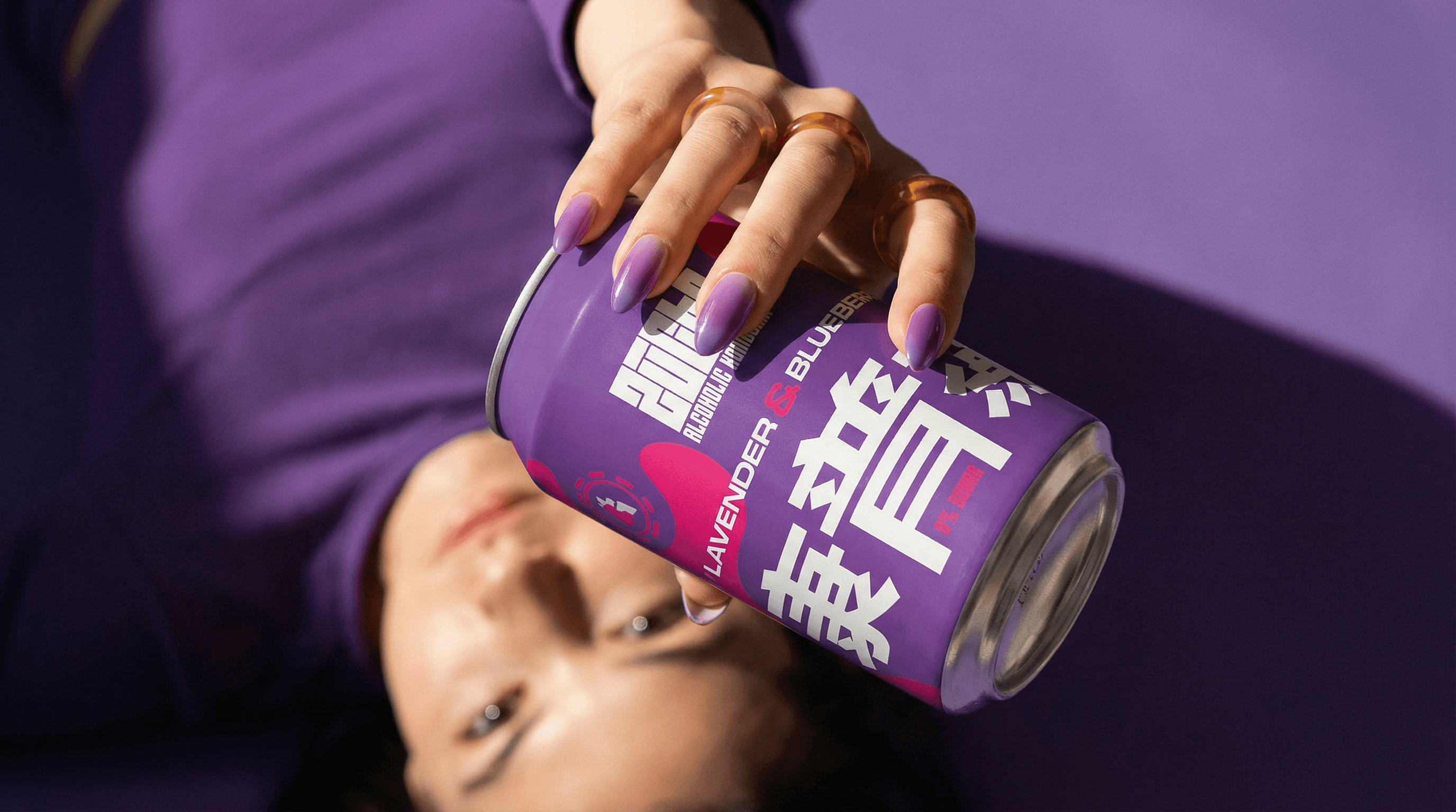 A close-up of a person wearing green-tinted glasses, with a serious expression and smooth skin.